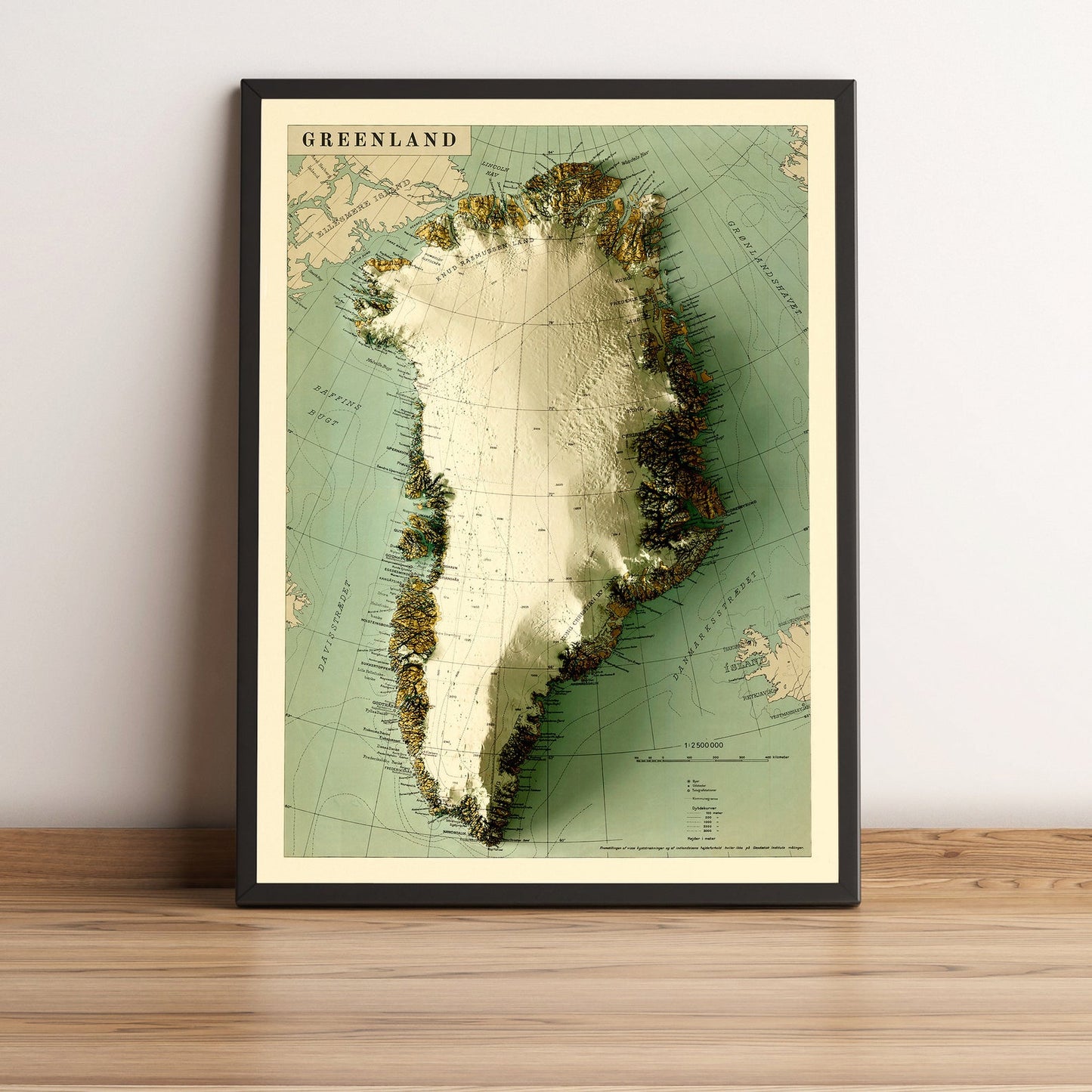Greenland vintage framed shaded relief map in black frame. Artistic print highlighting mountains with a realistic terrain effect