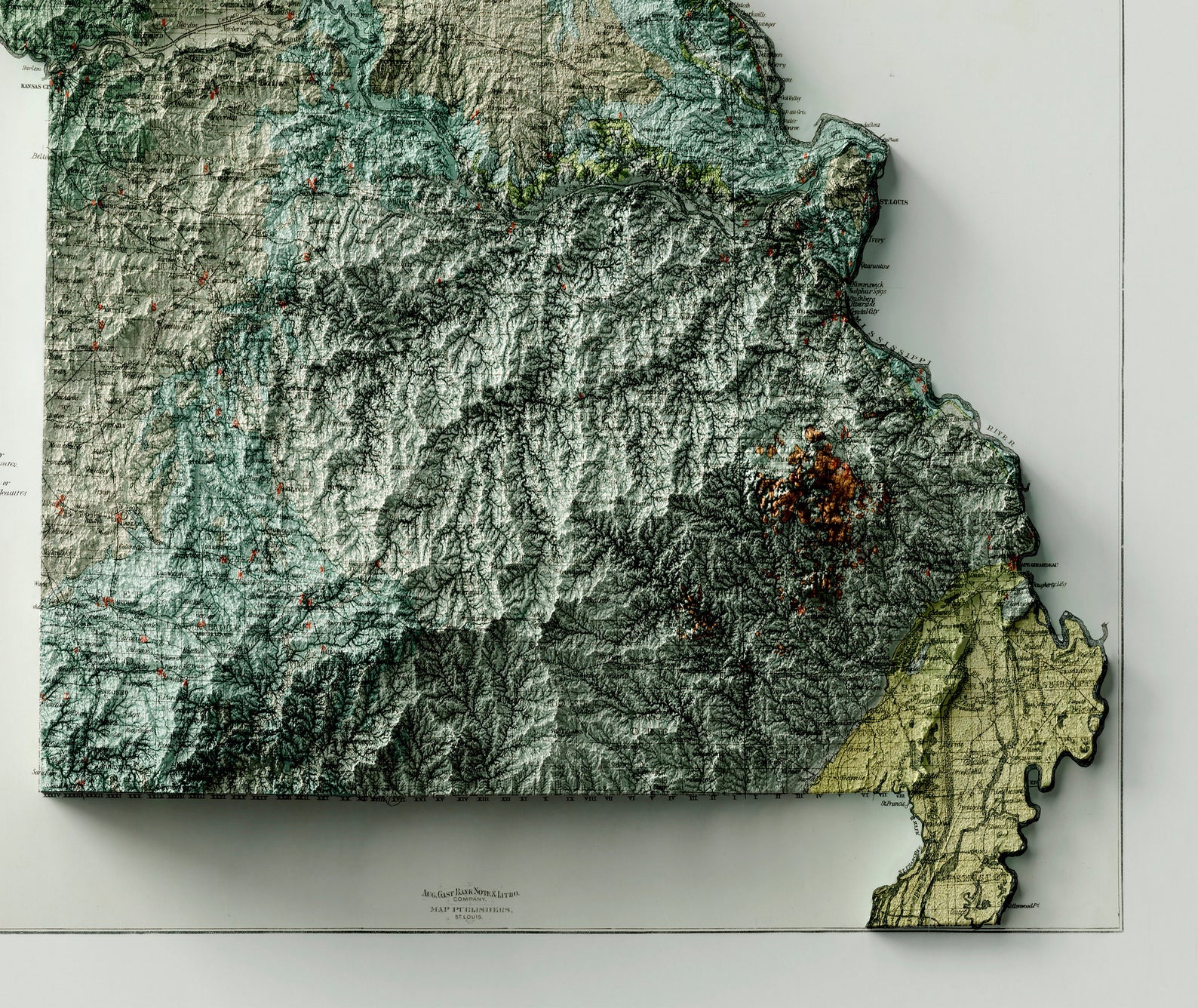 Detailed close-up of a vintage Missouri (USA) relief map, showcasing textured topography and geographic contours