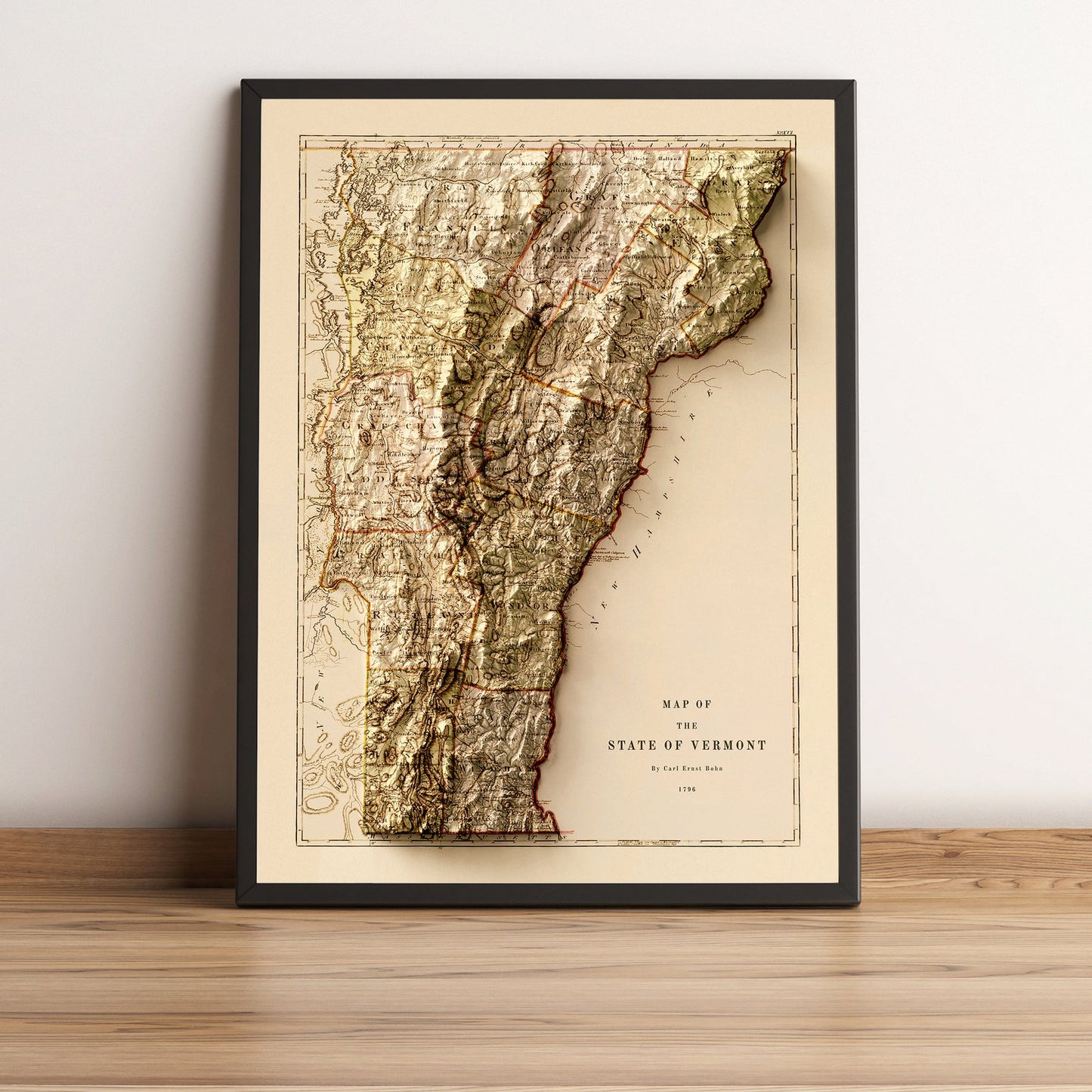 Vermont (USA) vintage framed shaded relief map in black frame. Artistic print highlighting mountains with a realistic terrain effect