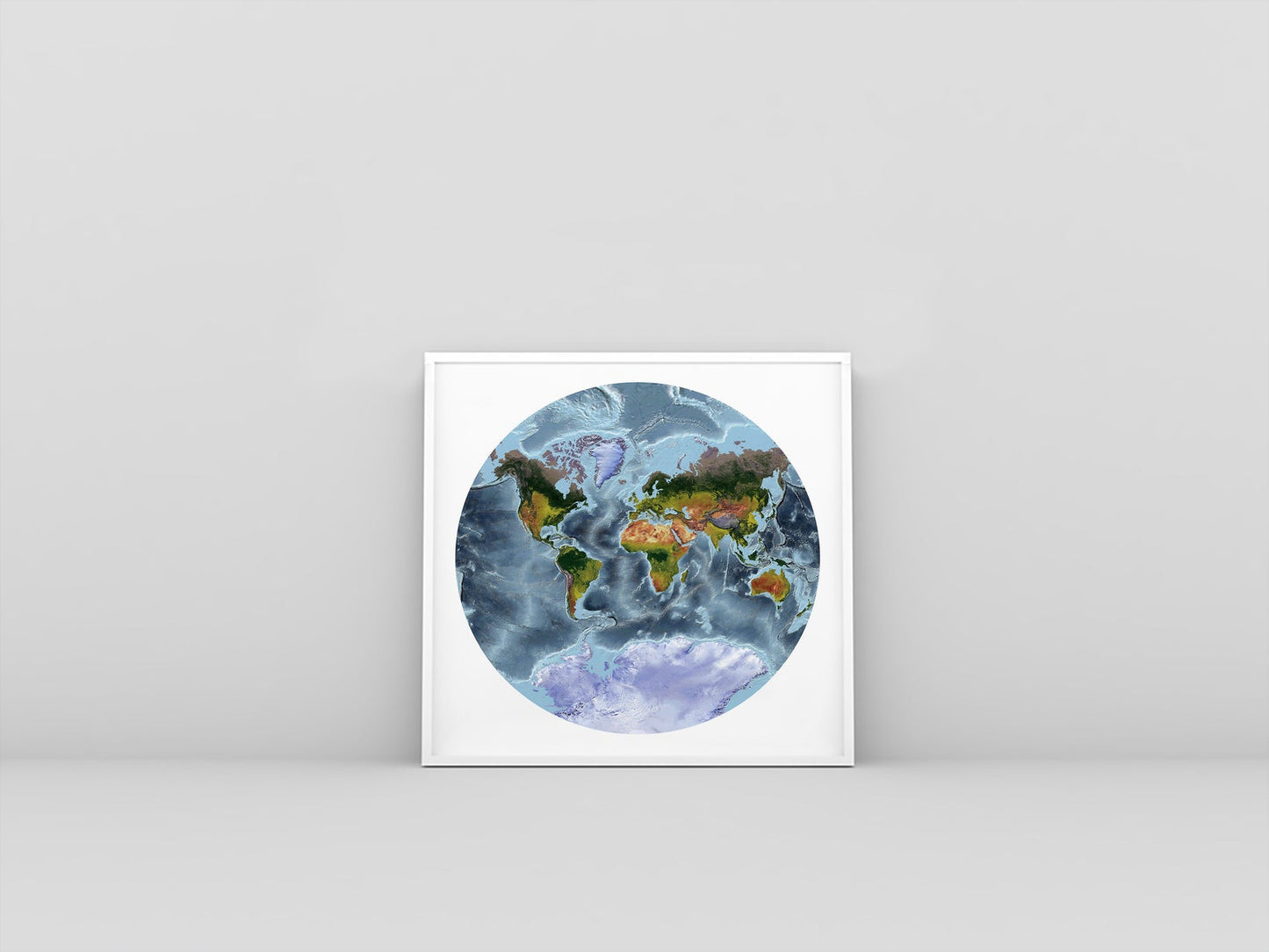 World framed shaded relief map in white frame. Van der Grinten Projection, an artistic print highlighting mountains and vegetation