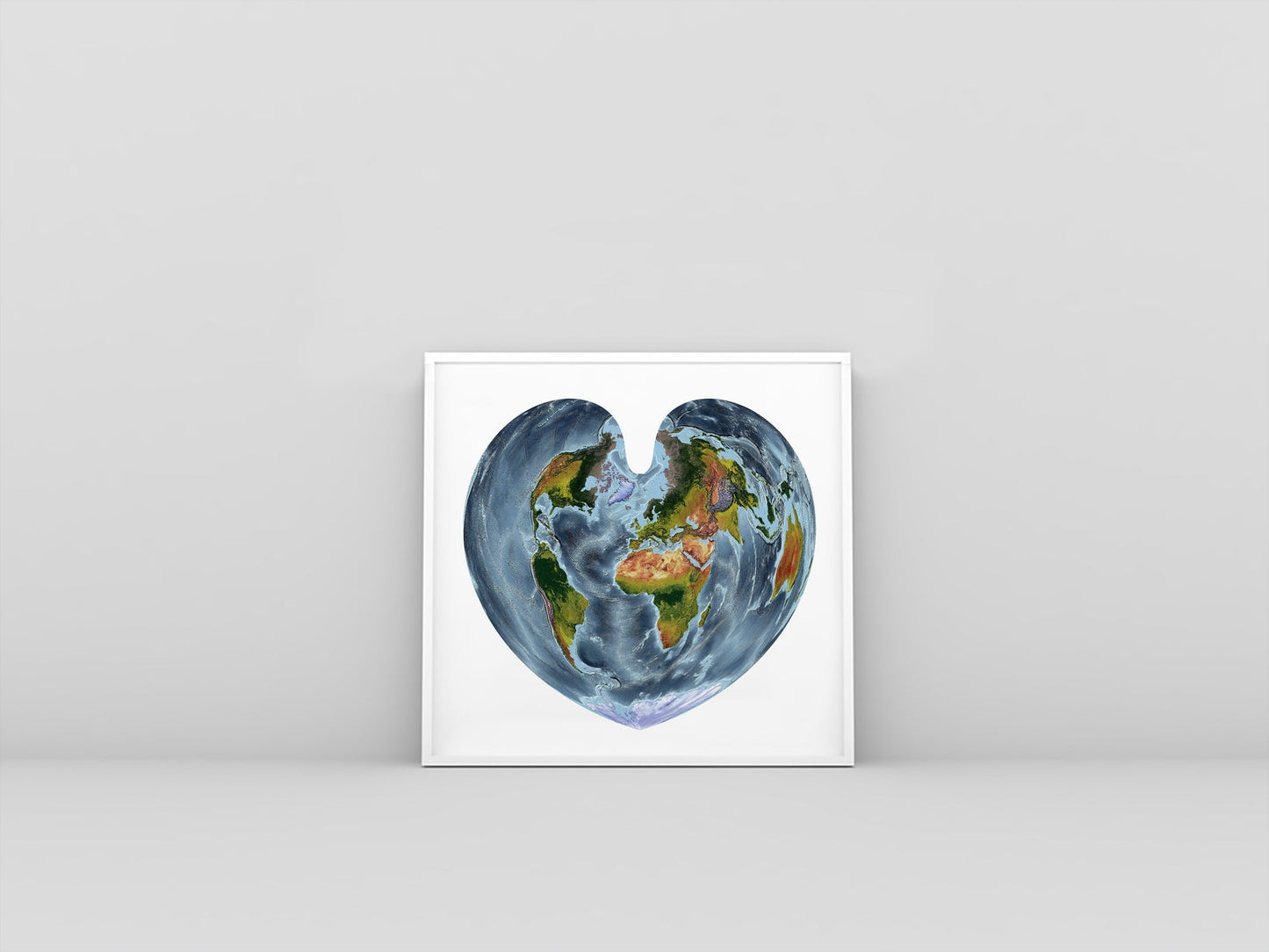 World framed shaded relief map in white frame. Bonne Projection, an artistic print highlighting mountains and vegetation