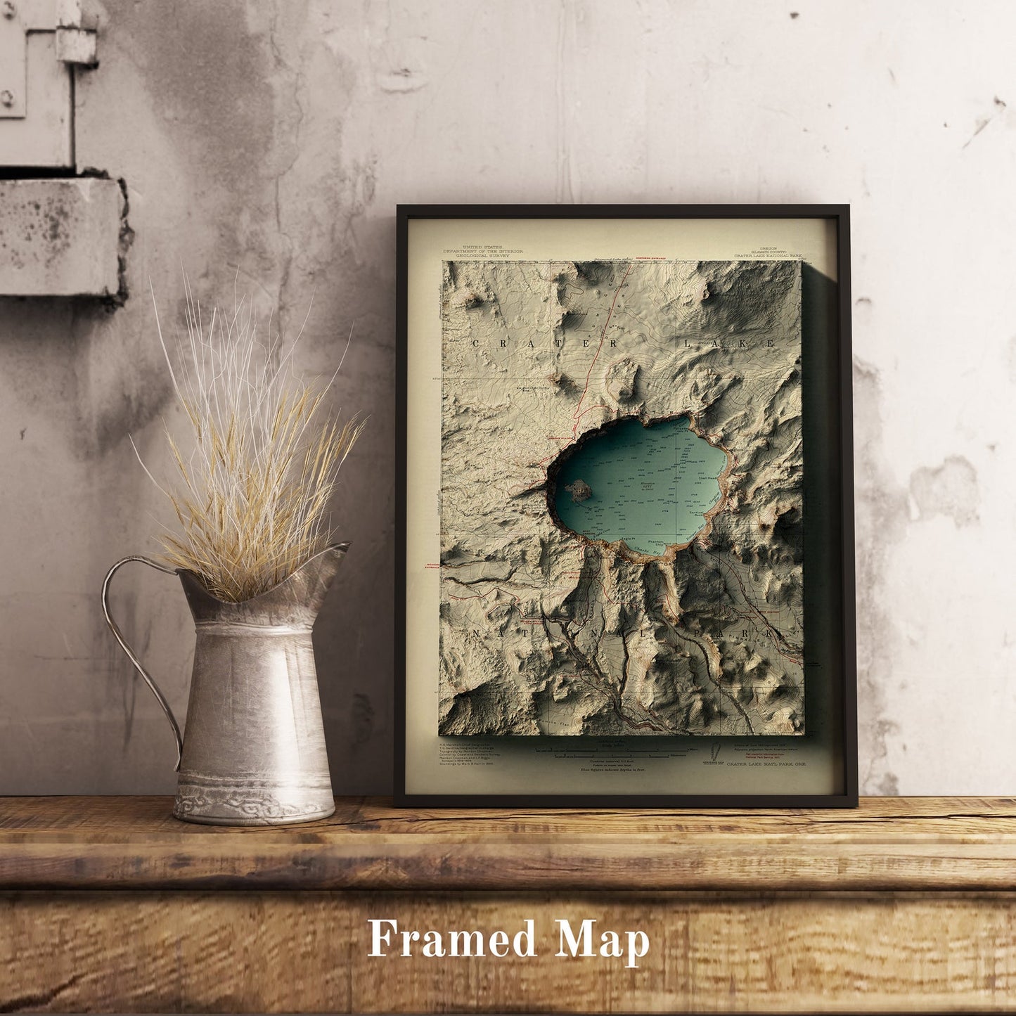 Vintage Crater Lake (USA) shaded relief map in black frame. Realistic terrain art print for home decor, displayed on rustic wooden table