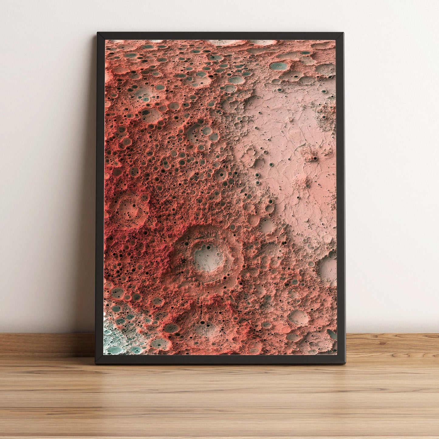Moon framed shaded relief map in black frame. Artistic print highlighting mountains with a realistic terrain effect