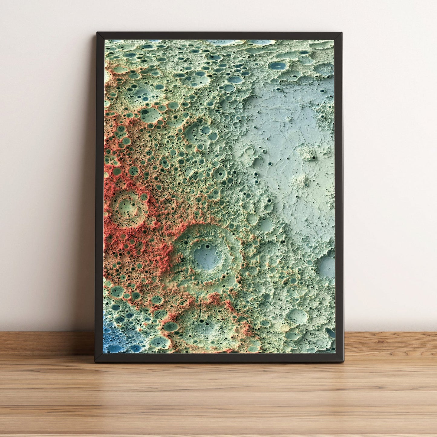 Moon framed shaded relief map in black frame. Artistic print highlighting mountains with a realistic terrain effect