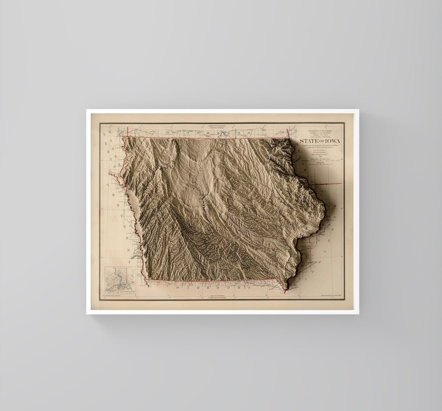 Iowa (USA) vintage framed shaded relief map in white frame. Artistic print highlighting mountains with a realistic 3d effect