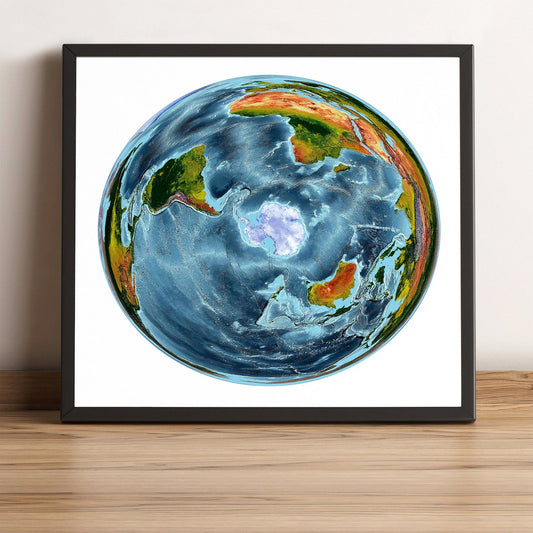 World framed shaded relief map in black frame, showing WGS 1984 Grid South Projection. Artistic print highlighting vegetation and bathymetry