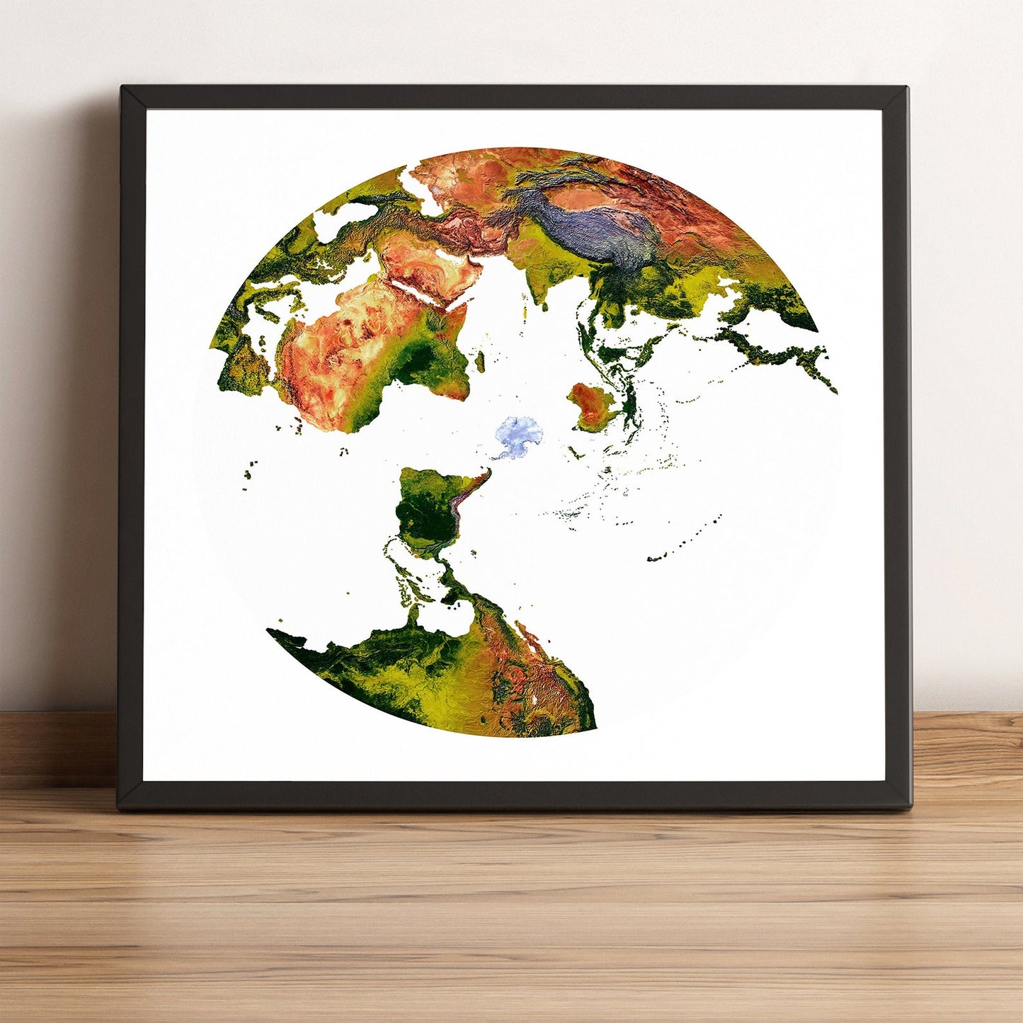 World framed shaded relief map in black frame, showing Australian Antarctic Polar Projection. Artistic print highlighting vegetation