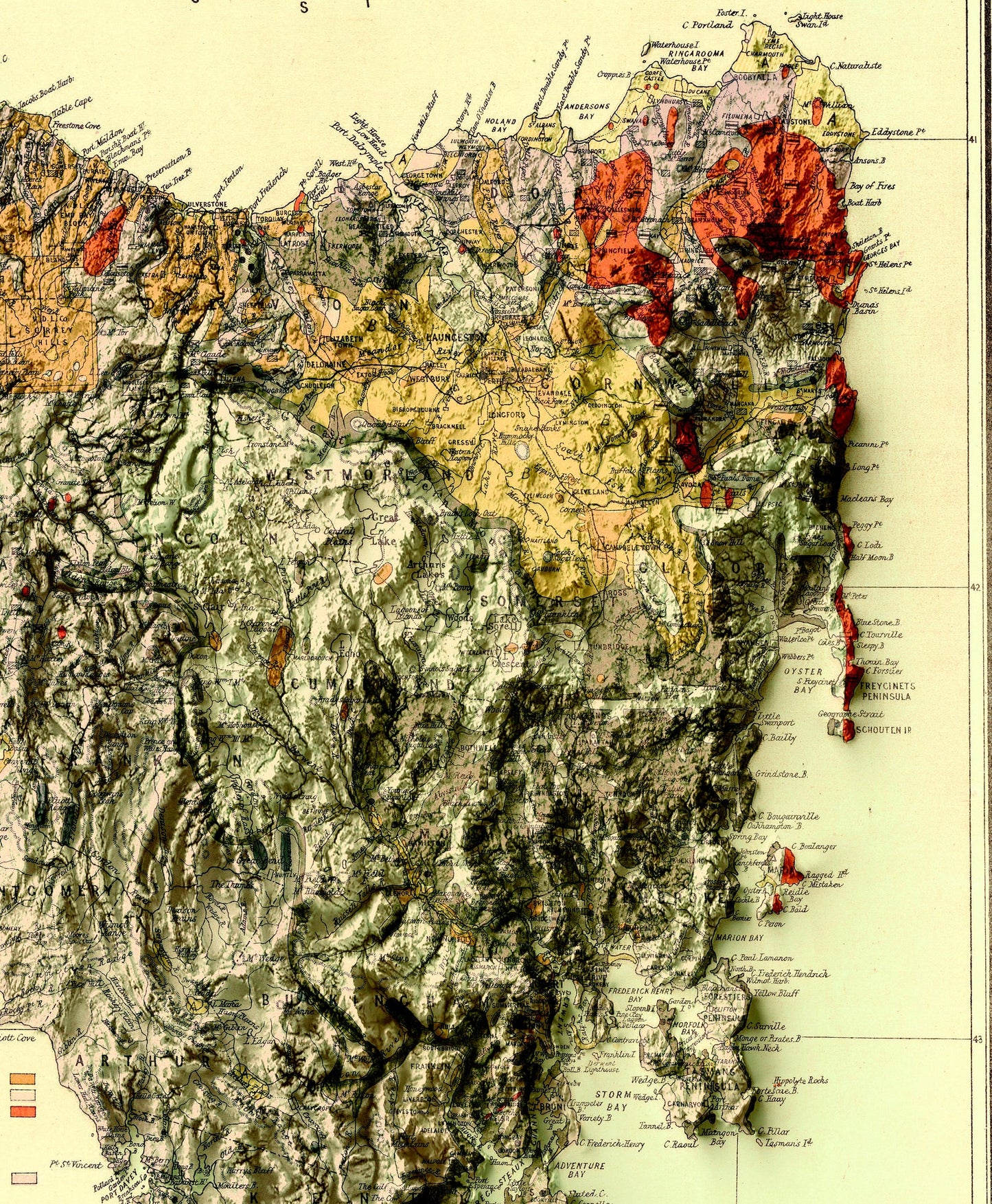 Detailed close-up of a vintage Tasmania (Australia) relief map, showcasing textured topography and geographic contours