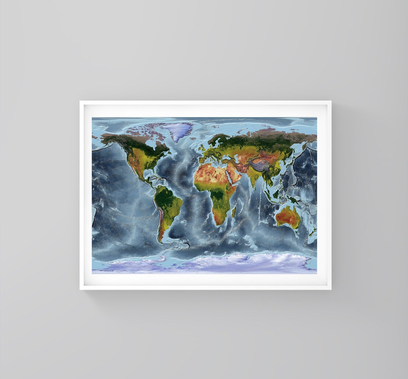 World framed shaded relief map in white frame. WGS84 Projection, an artistic print highlighting mountains and vegetation