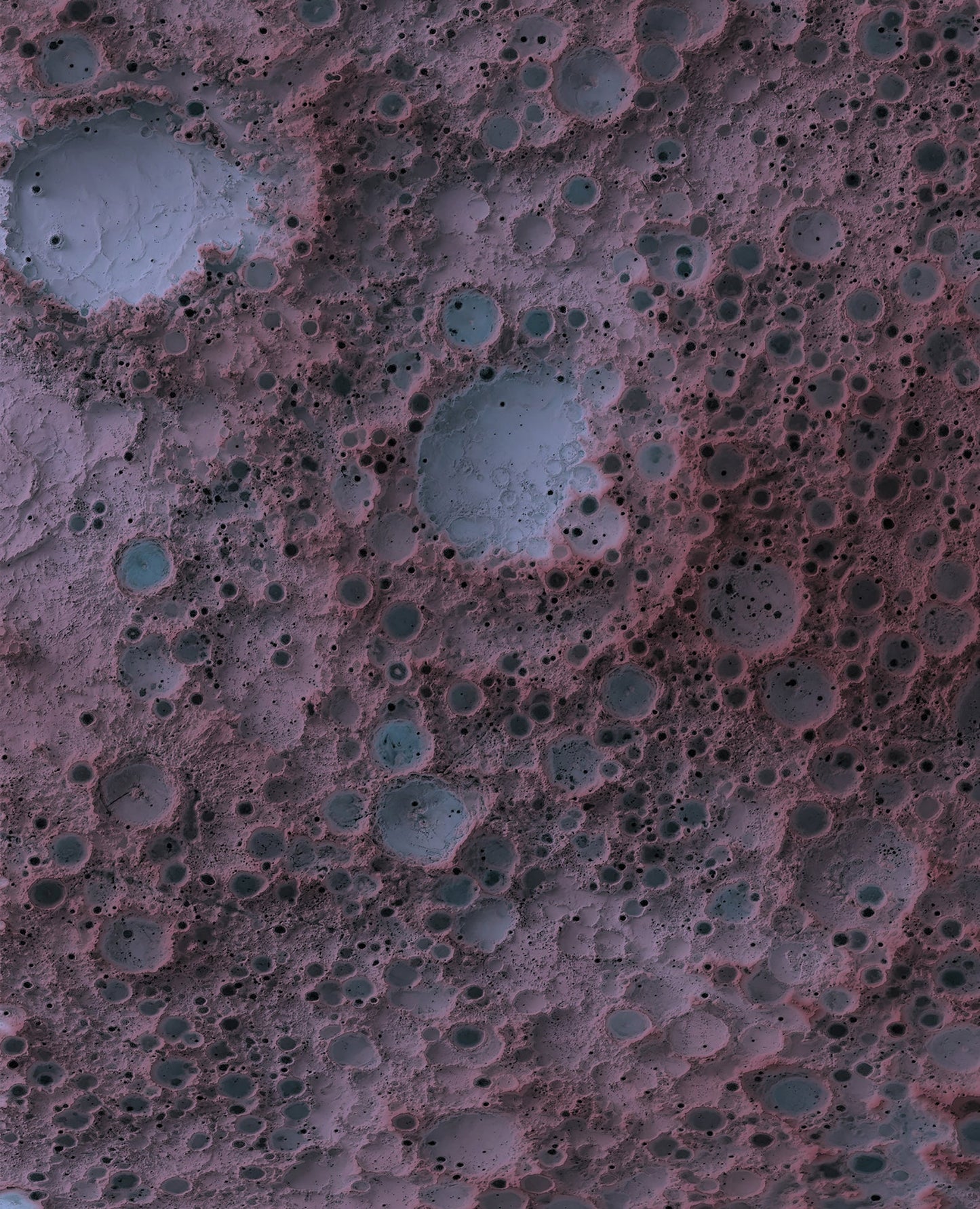 Detailed close-up of a Moon relief map, showcasing textured topography and geographic contours