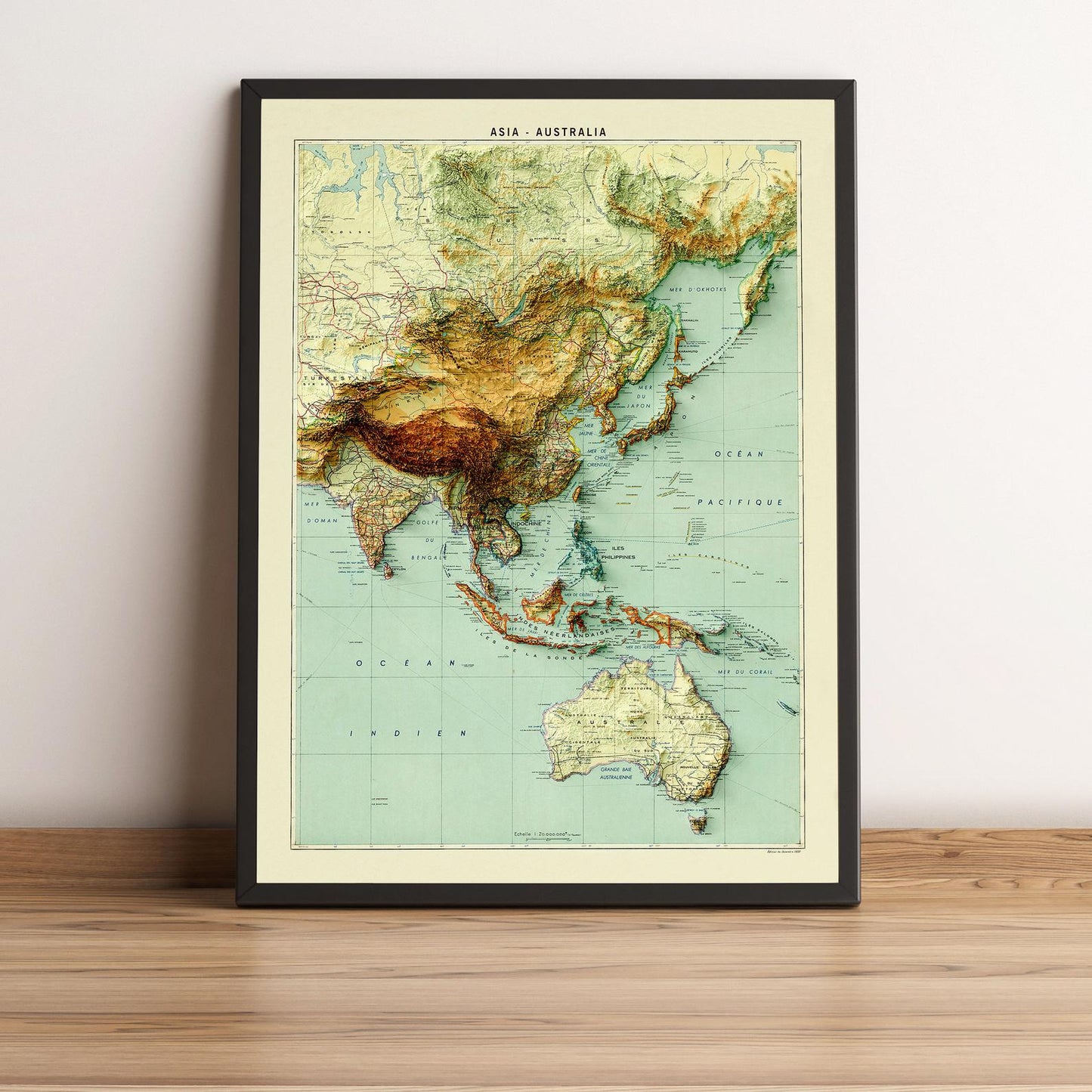 Asia and Australia vintage framed shaded relief map in black frame. Artistic print highlighting mountains with a realistic terrain effect
