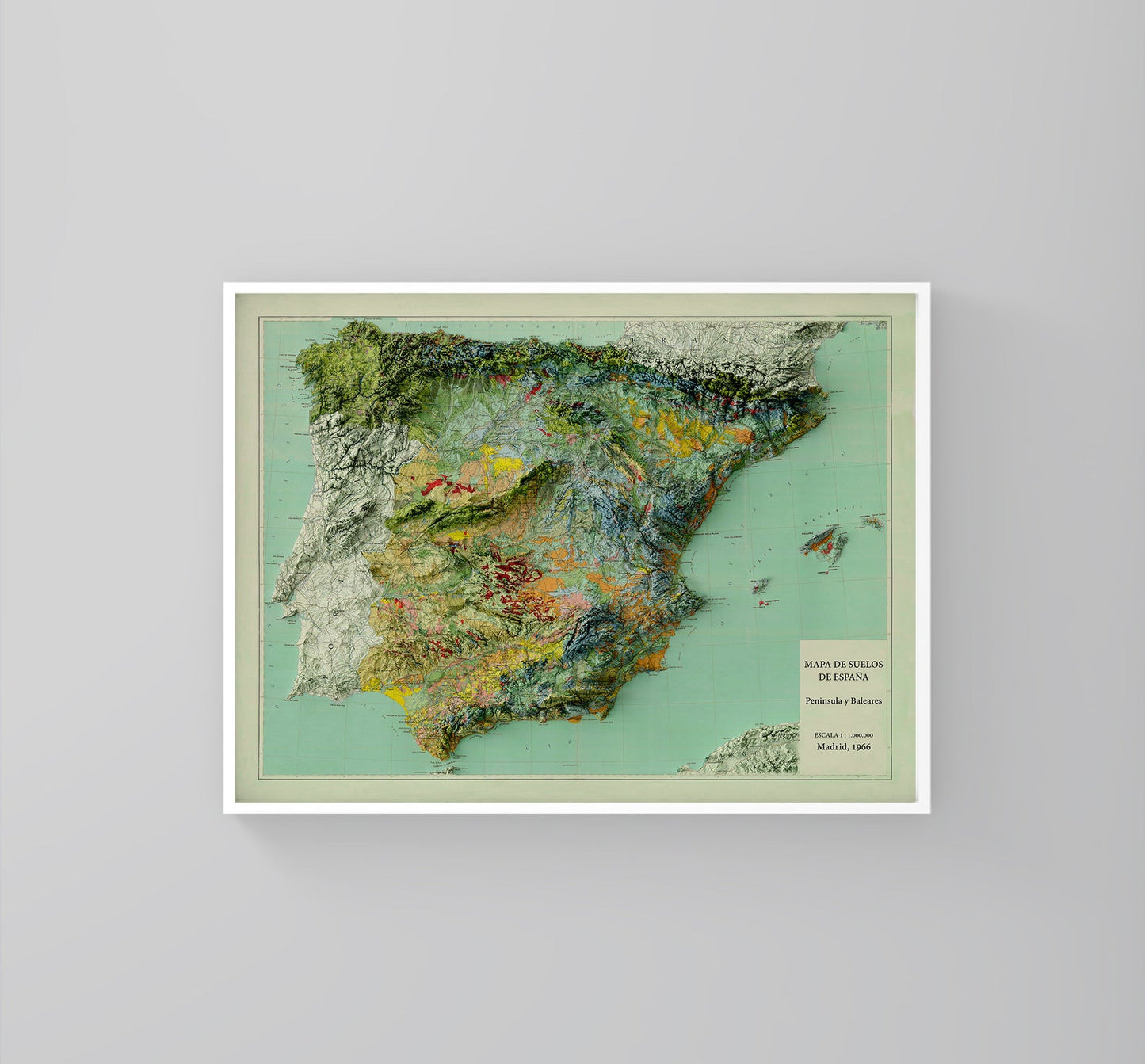 Spain vintage framed shaded relief map in white frame. Artistic print highlighting mountains with a realistic 3d effect
