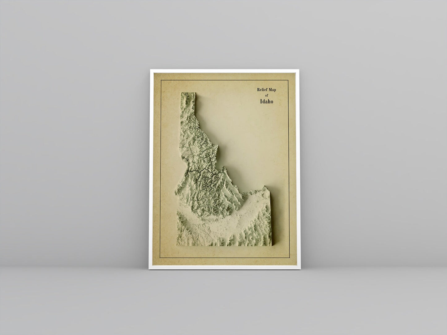 Idaho (USA) vintage framed shaded relief map in white frame. Artistic print highlighting mountains with a realistic 3d effect