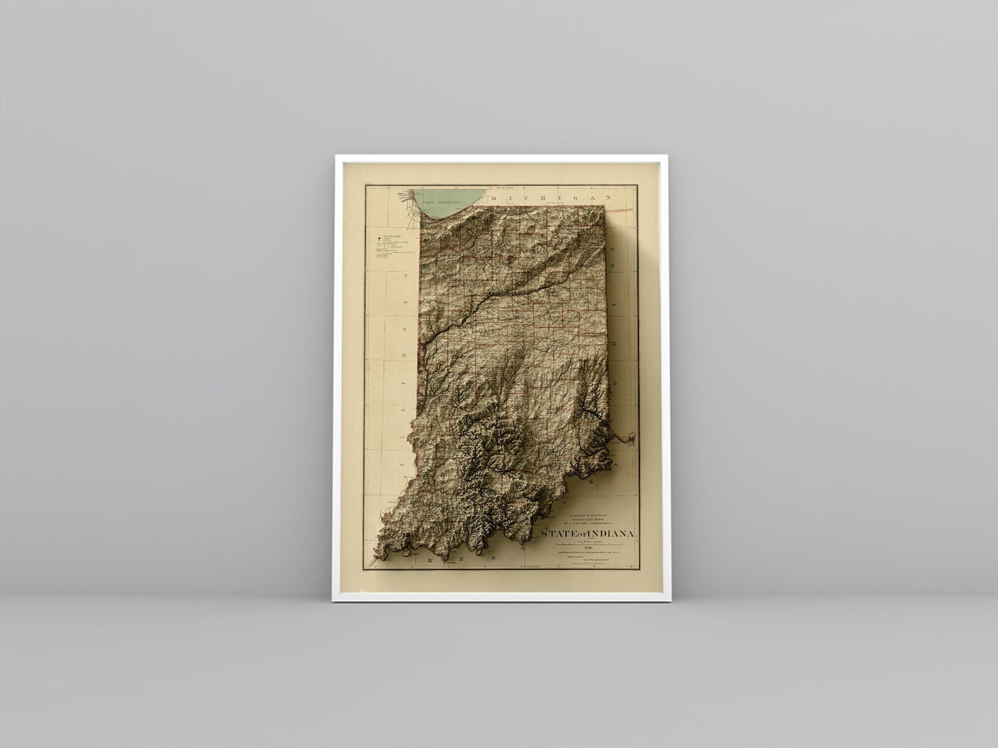 Indiana (USA) vintage framed shaded relief map in white frame. Artistic print highlighting mountains with a realistic 3d effect