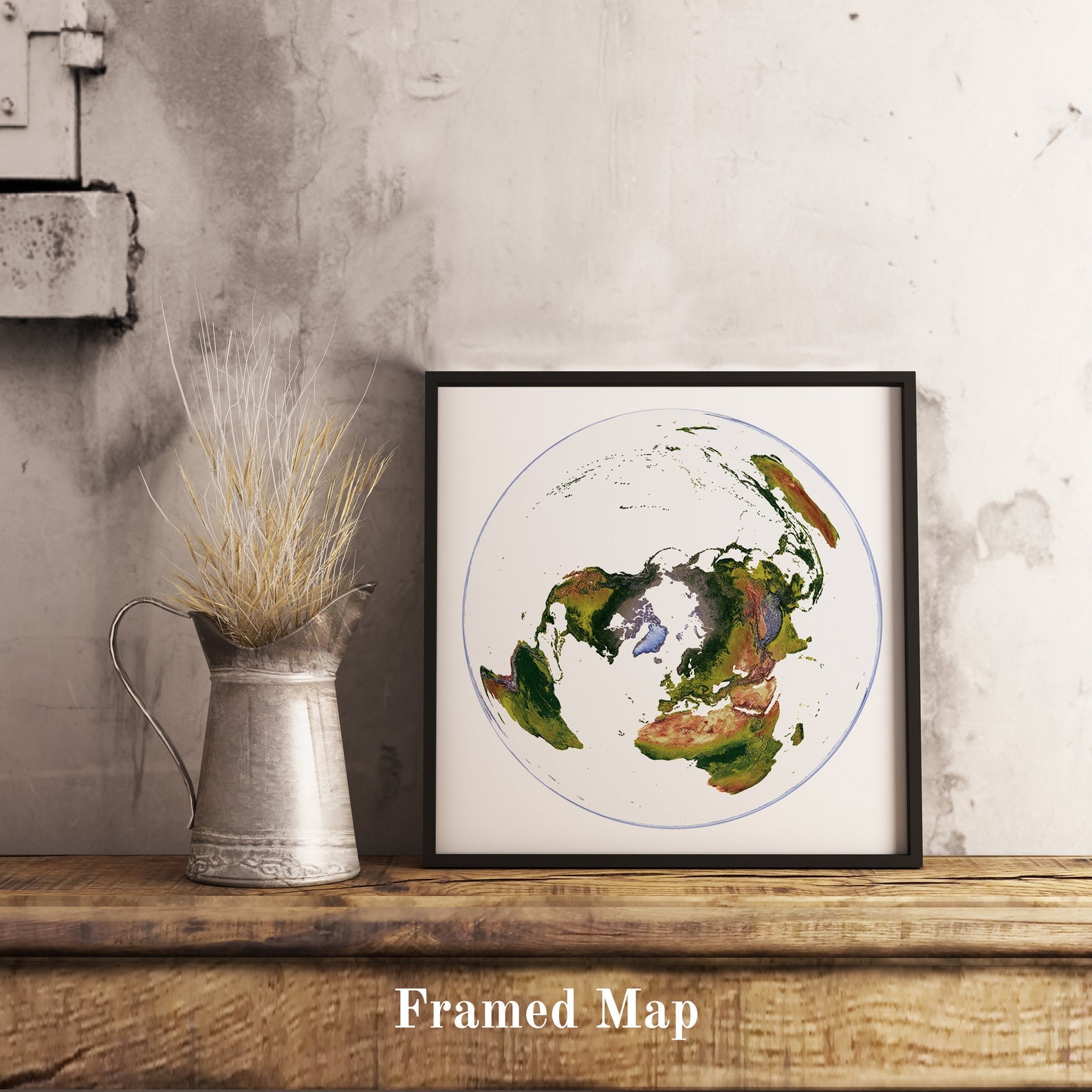 World shaded relief map in black frame, featuring the WGS 1984 Grid North Projection. Terrain art print for home decor, displayed on rustic wooden table