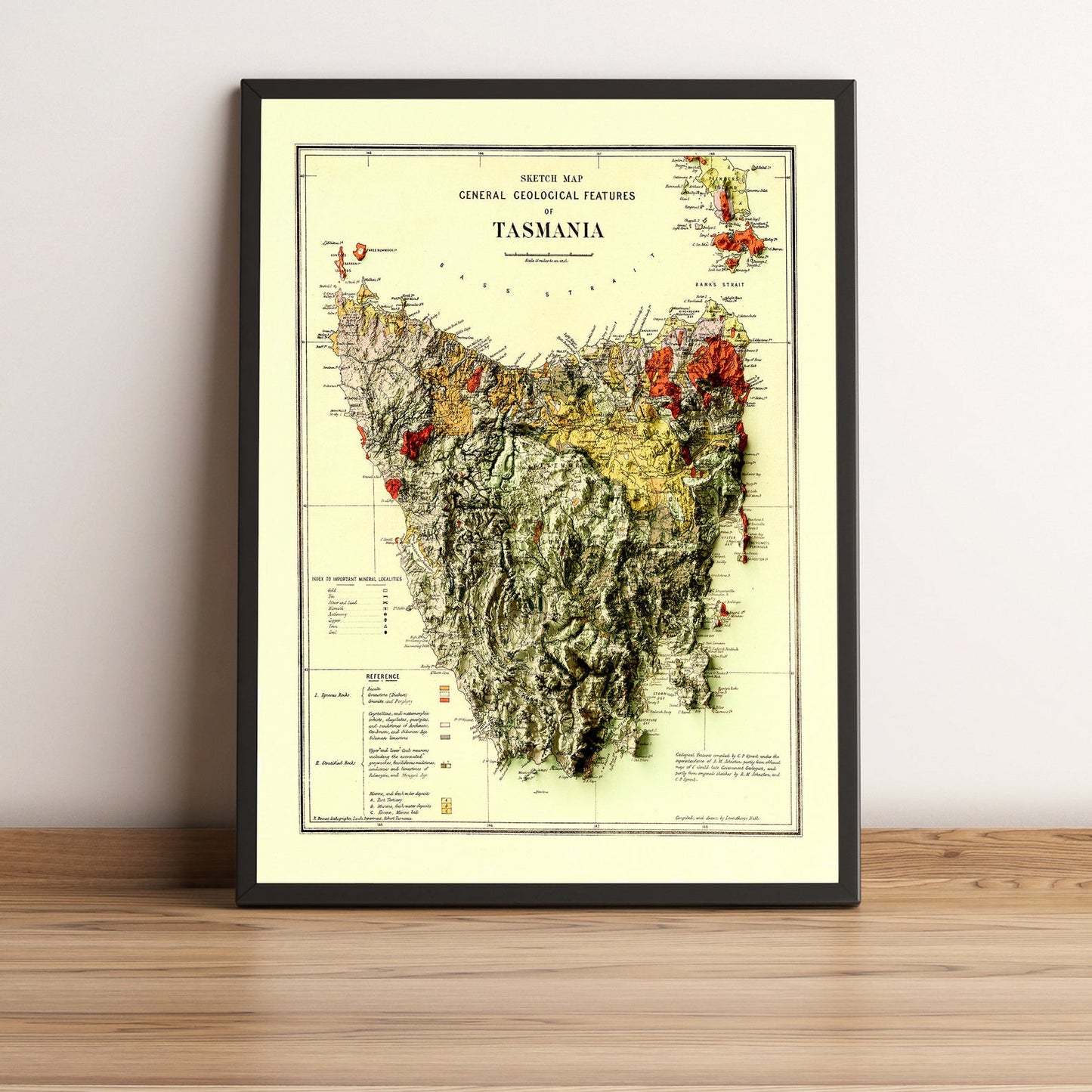 Tasmania (Australia) vintage framed shaded relief map in black frame. Artistic print highlighting mountains with a realistic terrain effect
