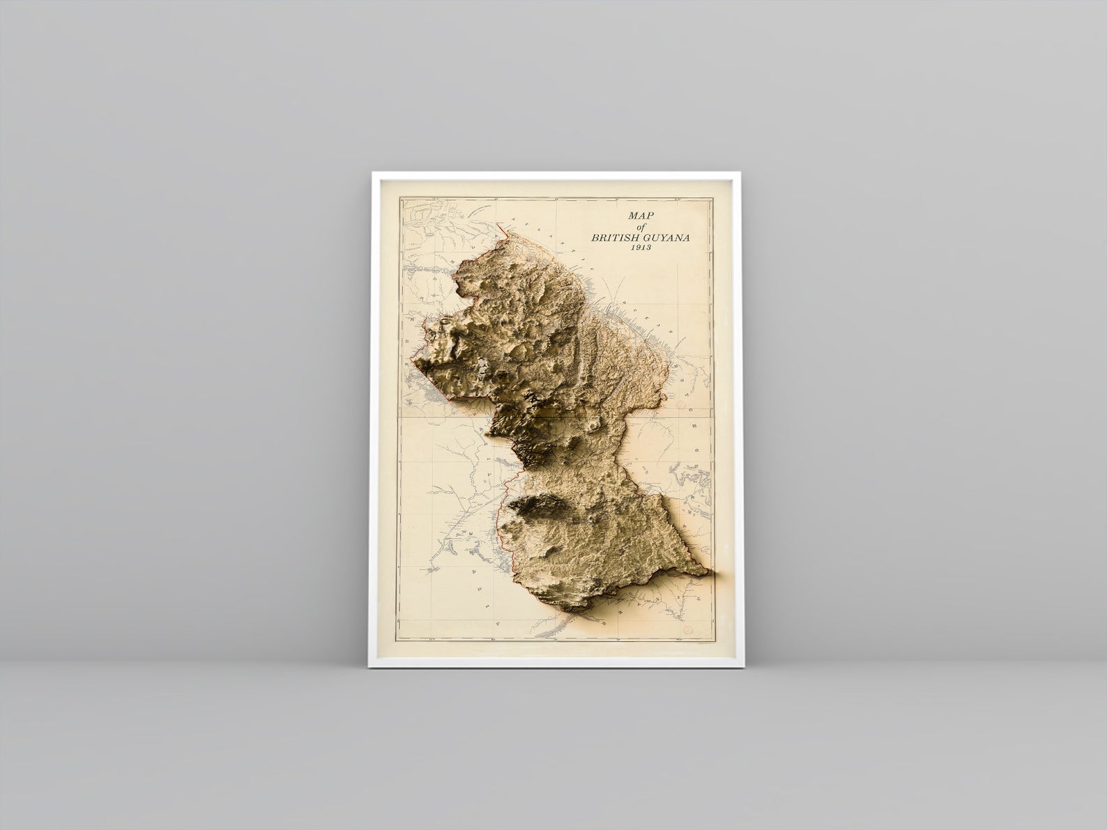 Guyana vintage framed shaded relief map in white frame. Artistic print highlighting mountains with a realistic 3d effect