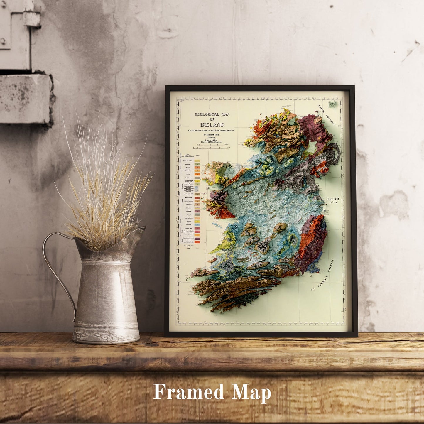 Vintage Ireland shaded relief map in black frame. Realistic terrain art print for home decor, displayed on rustic wooden table