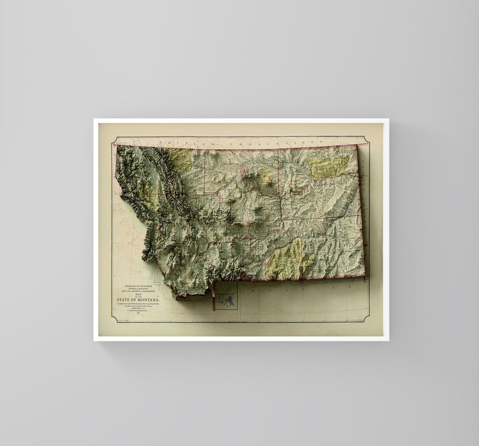 Montana (USA) vintage framed shaded relief map in white frame. Artistic print highlighting mountains with a realistic 3d effect