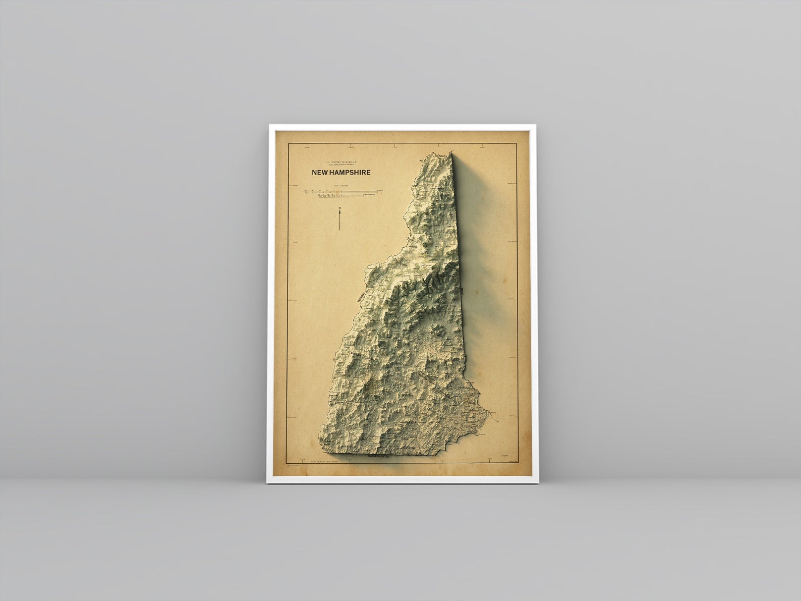 New Hampshire (USA) vintage framed shaded relief map in white frame. Artistic print highlighting mountains with a realistic 3d effect