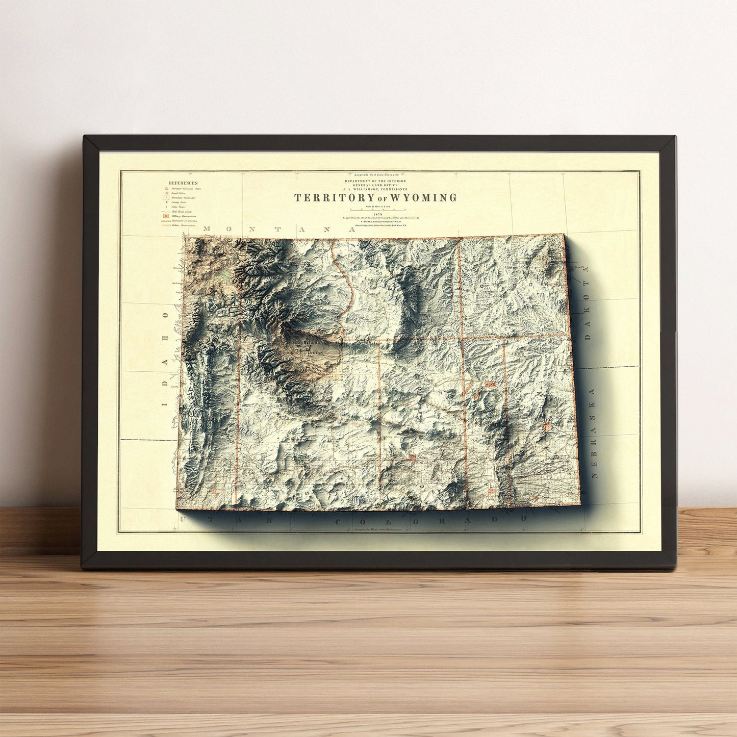 Wyoming (USA) vintage framed shaded relief map in black frame. Artistic print highlighting mountains with a realistic terrain effect