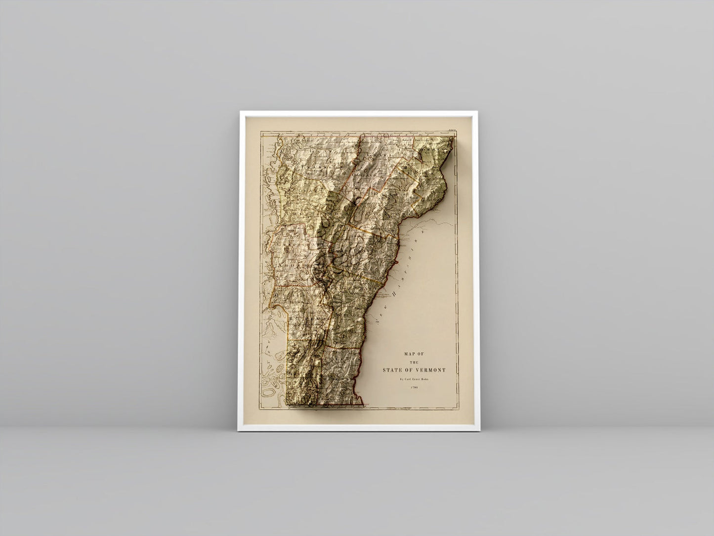 Vermont (USA) vintage framed shaded relief map in white frame. Artistic print highlighting mountains with a realistic 3d effect