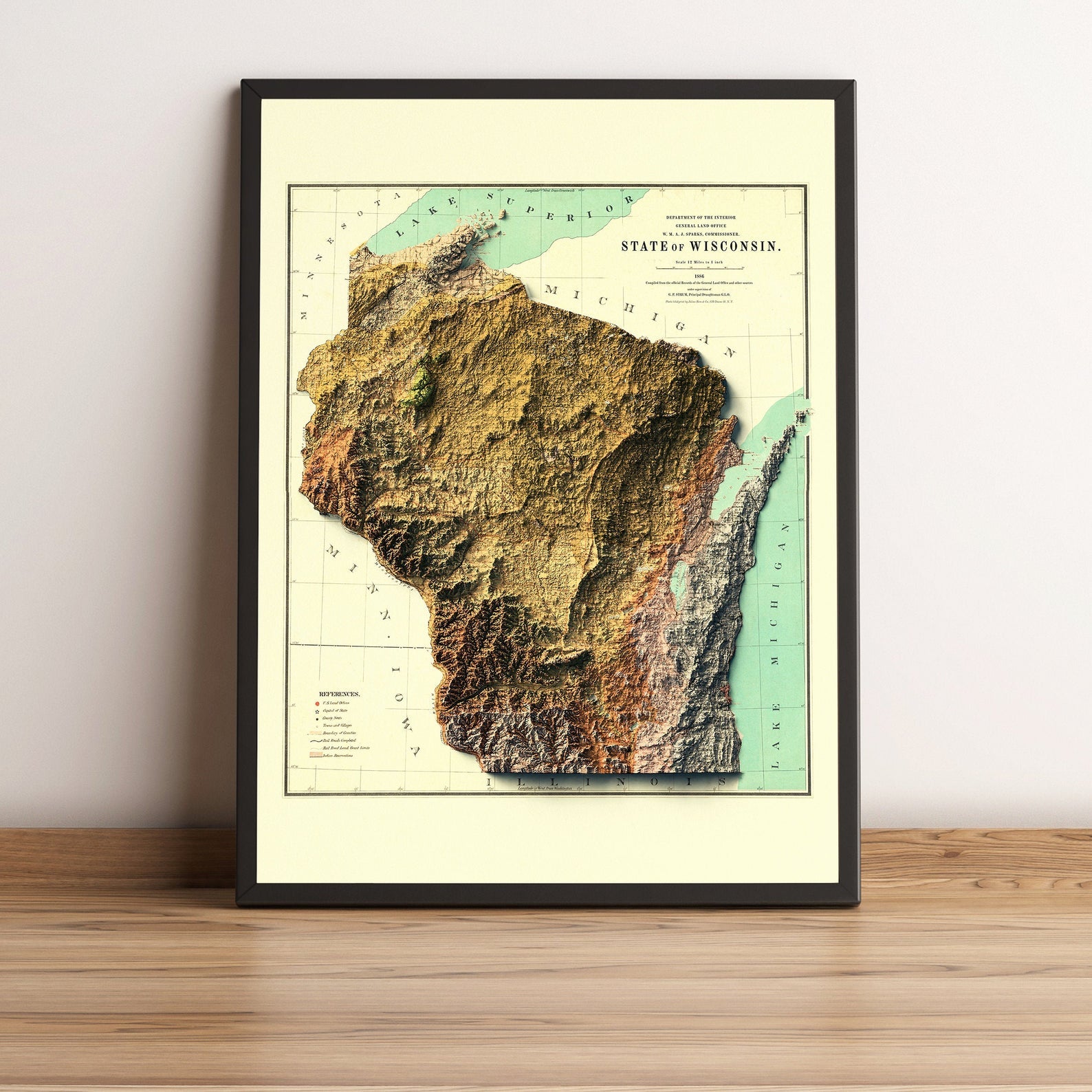 Wisconsin (USA) vintage framed shaded relief map in black frame. Artistic print highlighting mountains with a realistic terrain effect