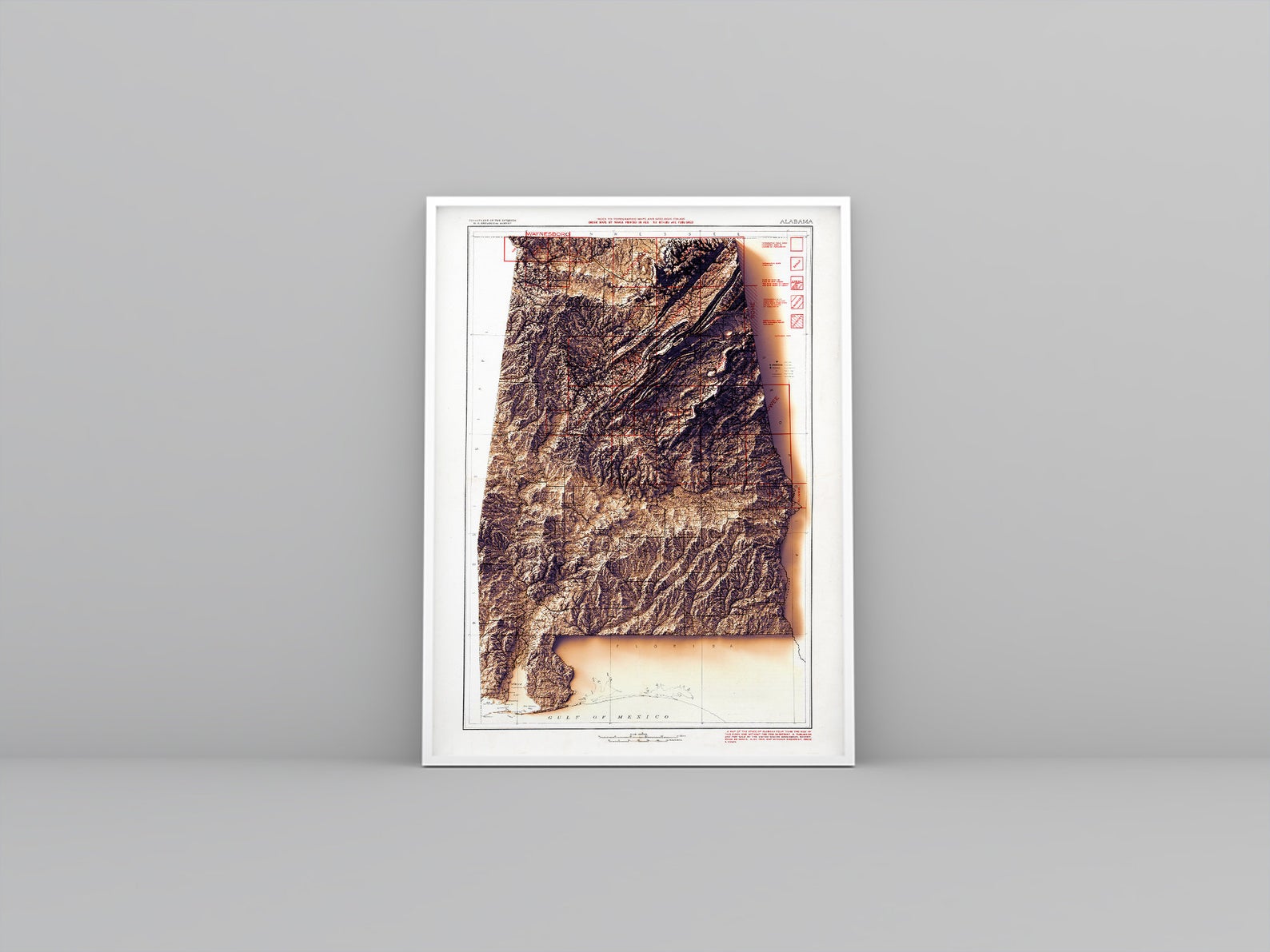 Alabama (USA) vintage framed shaded relief map in white frame. Artistic print highlighting mountains with a realistic 3d effect