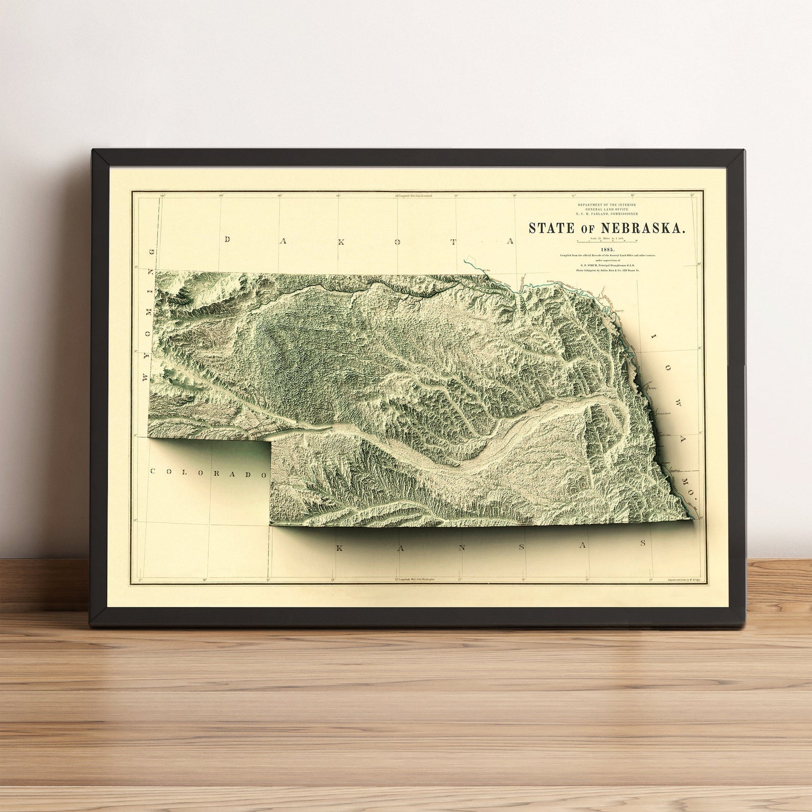 Nebraska (USA) vintage framed shaded relief map in black frame. Artistic print highlighting mountains with a realistic terrain effect