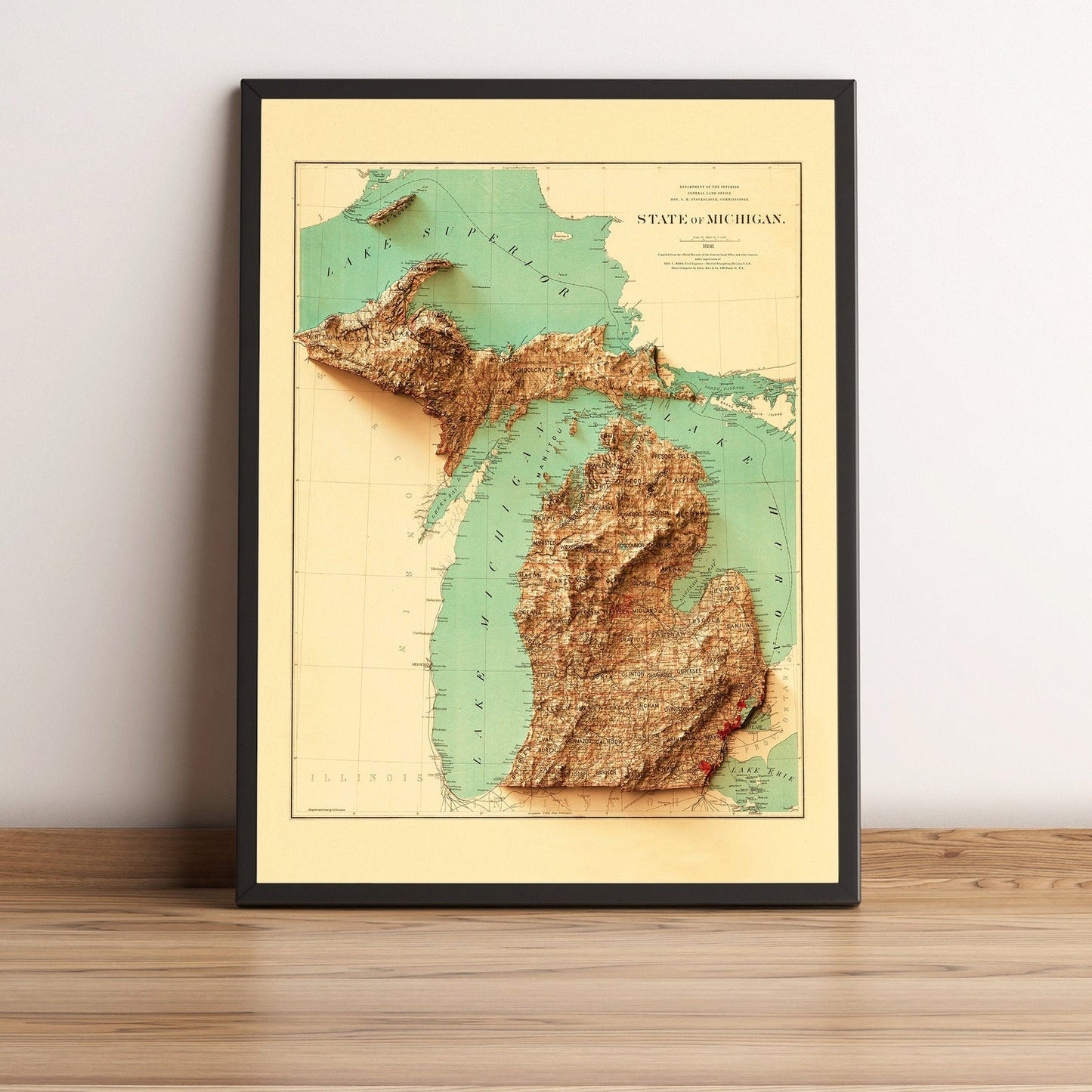 Michigan (USA) vintage framed shaded relief map in black frame. Artistic print highlighting mountains with a realistic terrain effect
