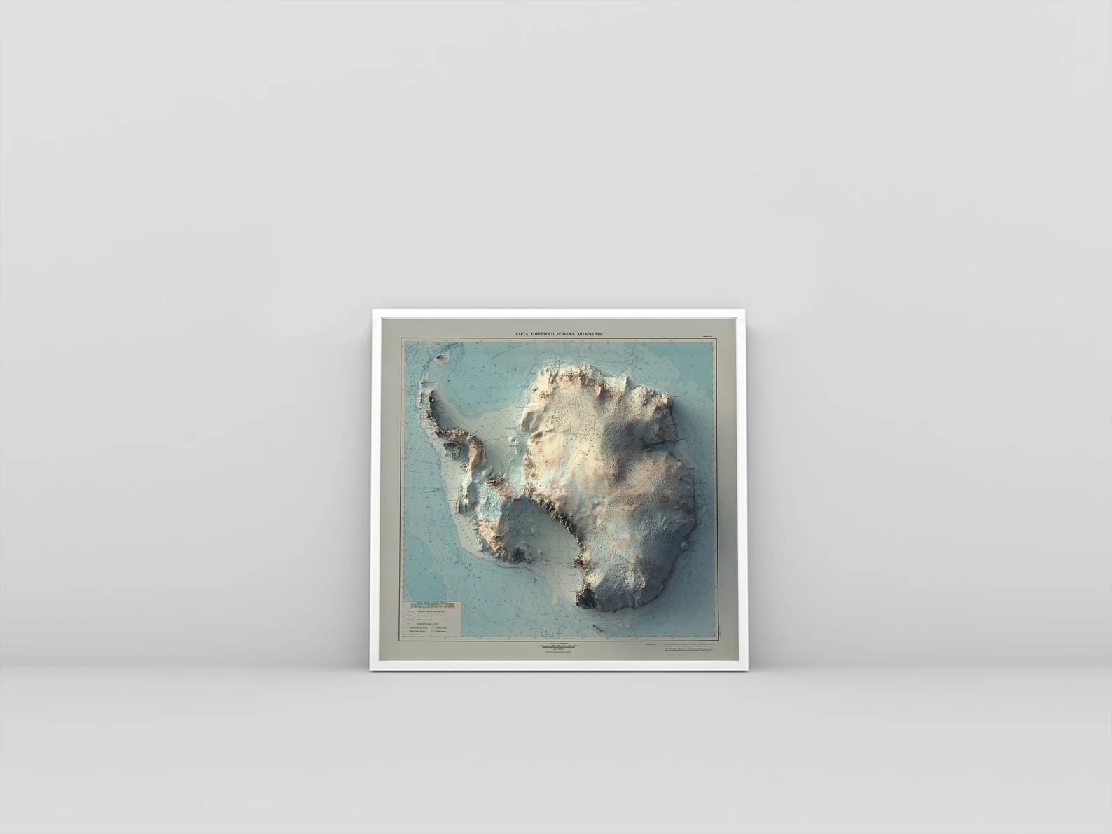 Antarctic vintage framed shaded relief map in white frame. Artistic print highlighting mountains with a realistic 3d effect
