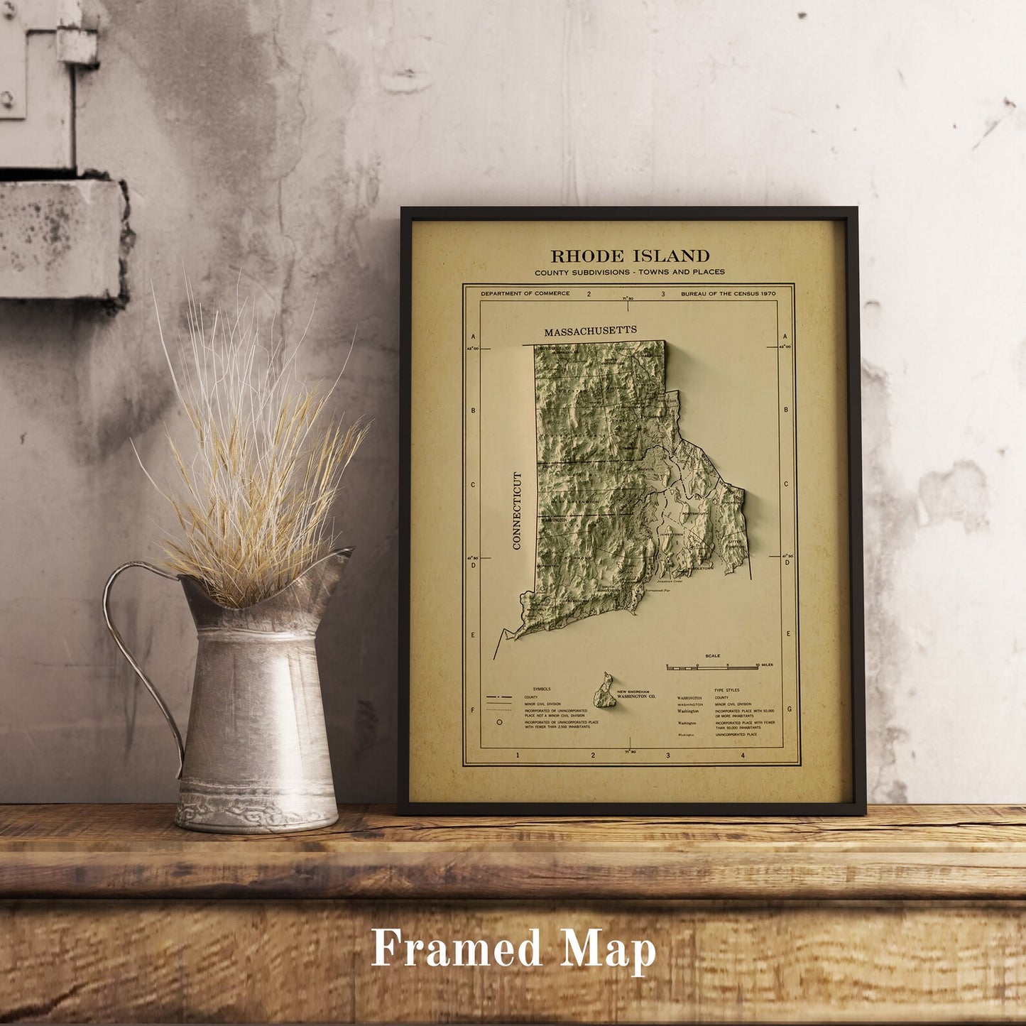 Vintage Rhode Island (USA) shaded relief map in black frame. Realistic terrain art print for home decor, displayed on rustic wooden table