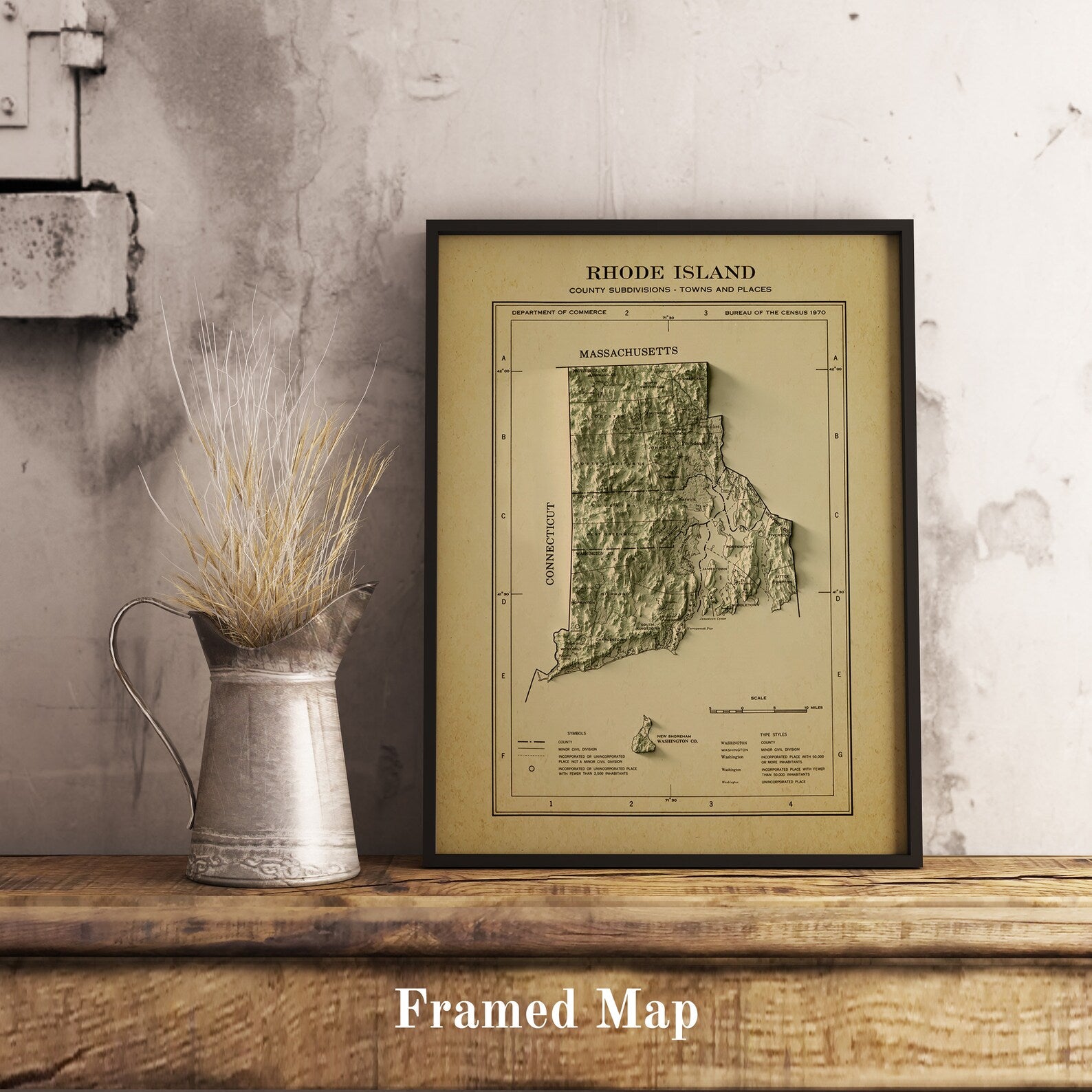 Vintage Rhode Island (USA) shaded relief map in black frame. Realistic terrain art print for home decor, displayed on rustic wooden table