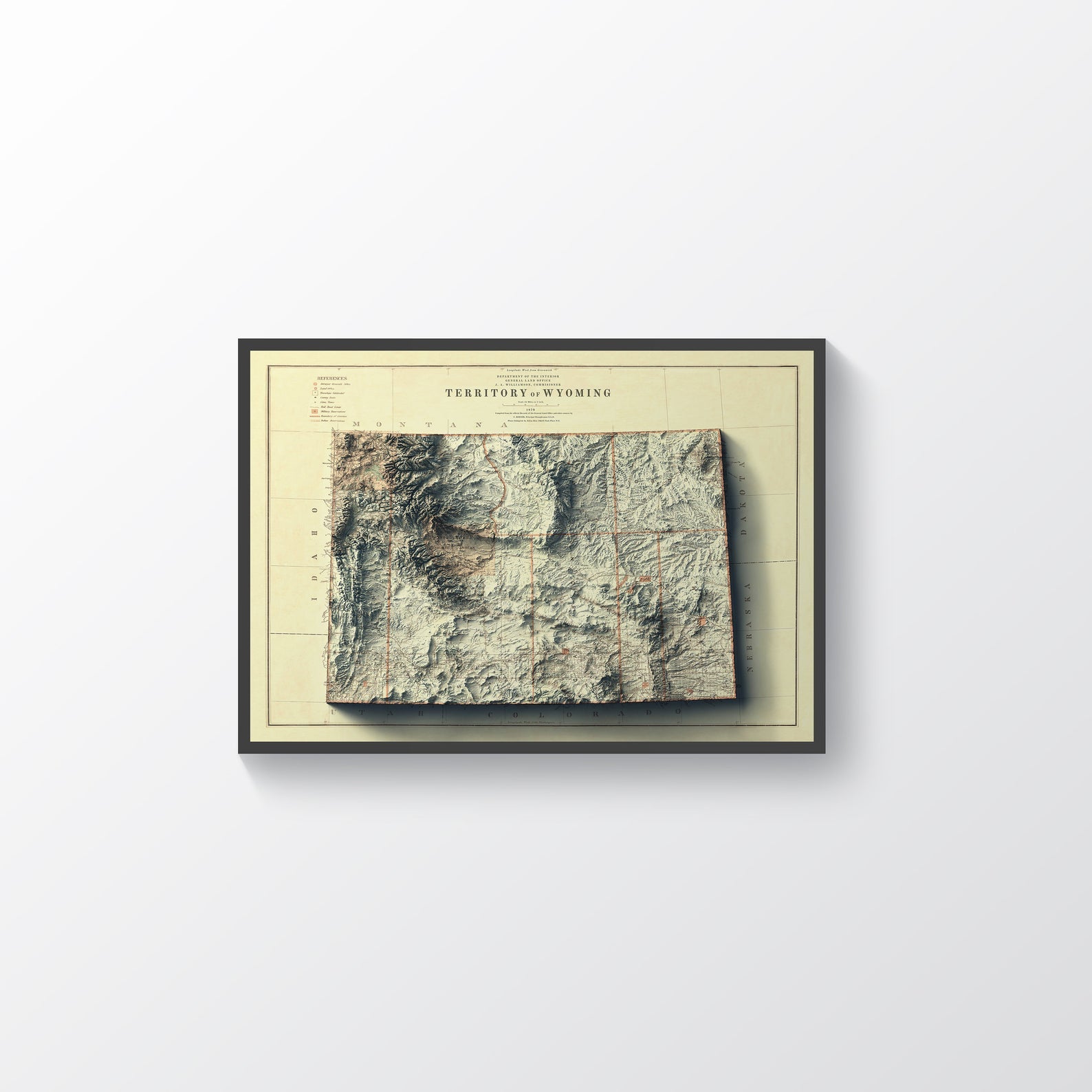 Wyoming (USA) vintage framed shaded relief map in black frame. Artistic print highlighting mountains with a realistic terrain effect