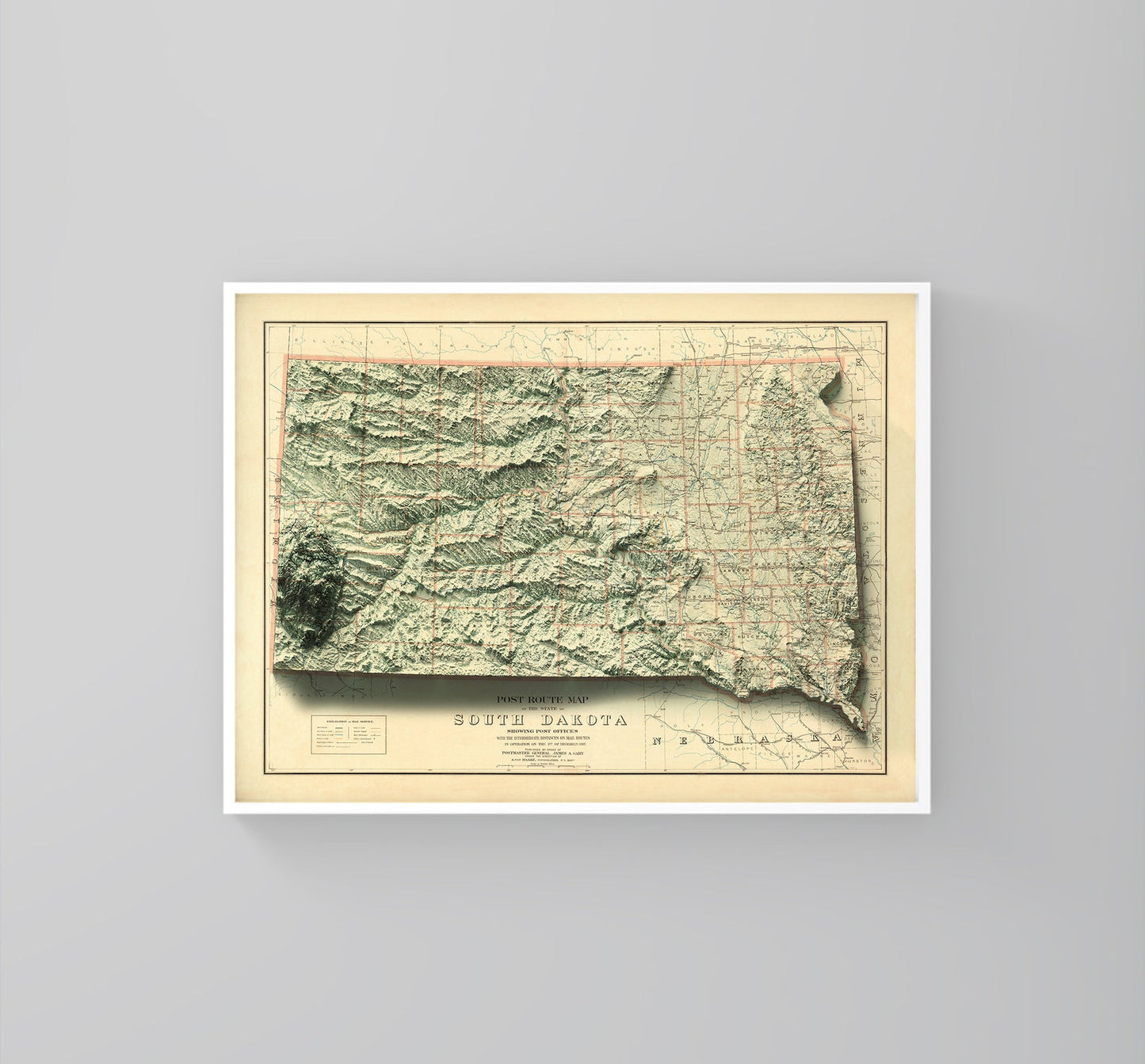 South Dakota (USA) vintage framed shaded relief map in white frame. Artistic print highlighting mountains with a realistic 3d effect