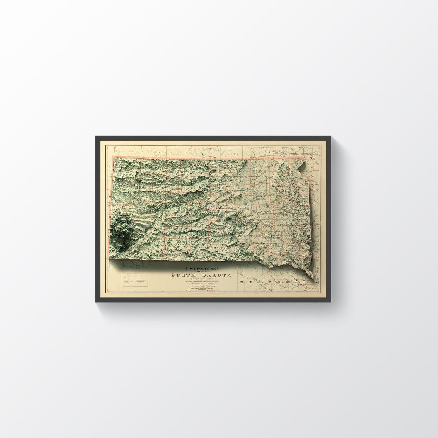 South Dakota USA vintage framed shaded relief map in black frame. Artistic print highlighting mountains with a realistic terrain effect