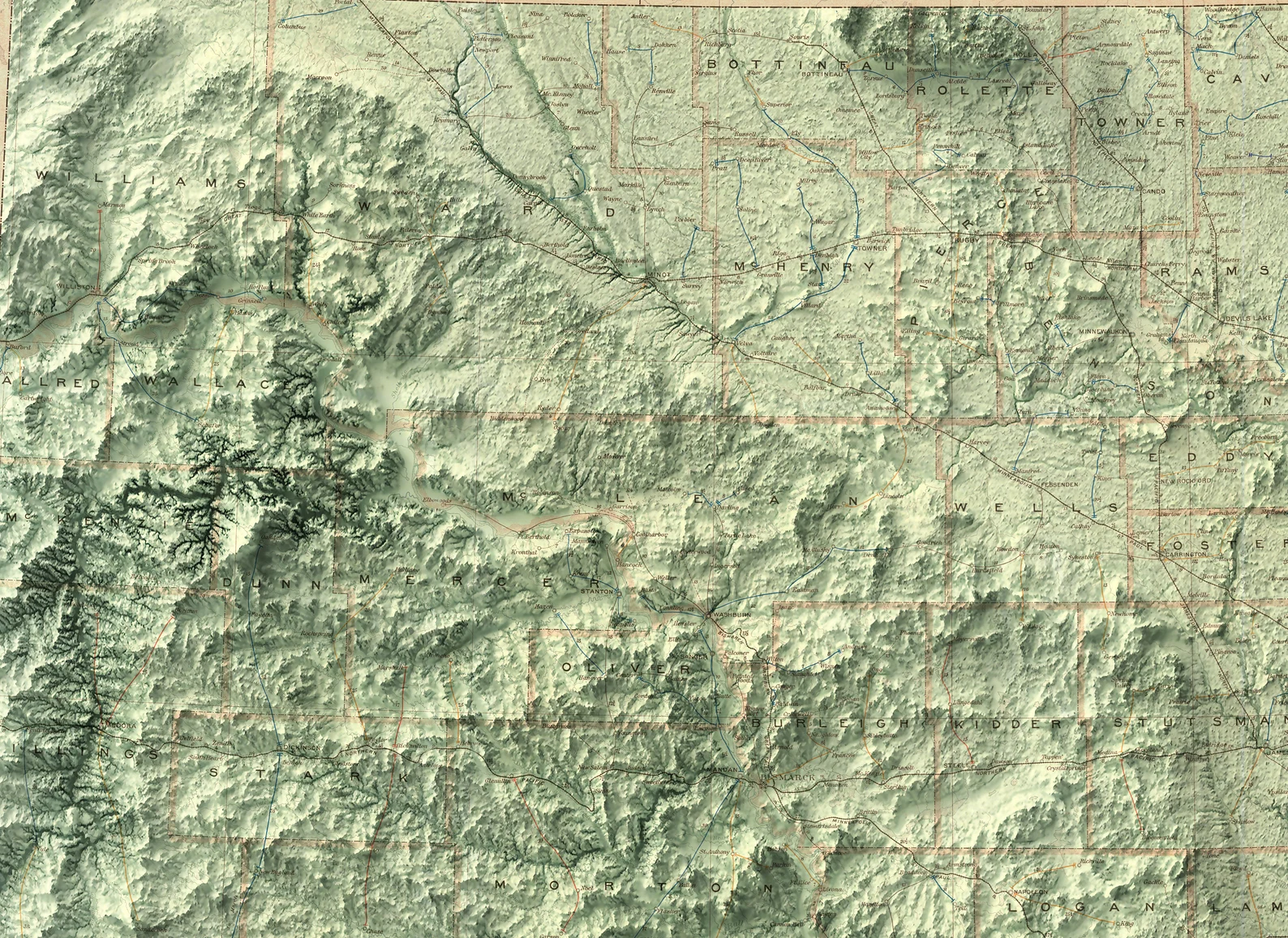 Detailed close-up of a vintage North Dakota (USA) relief map, showcasing textured topography and geographic contours