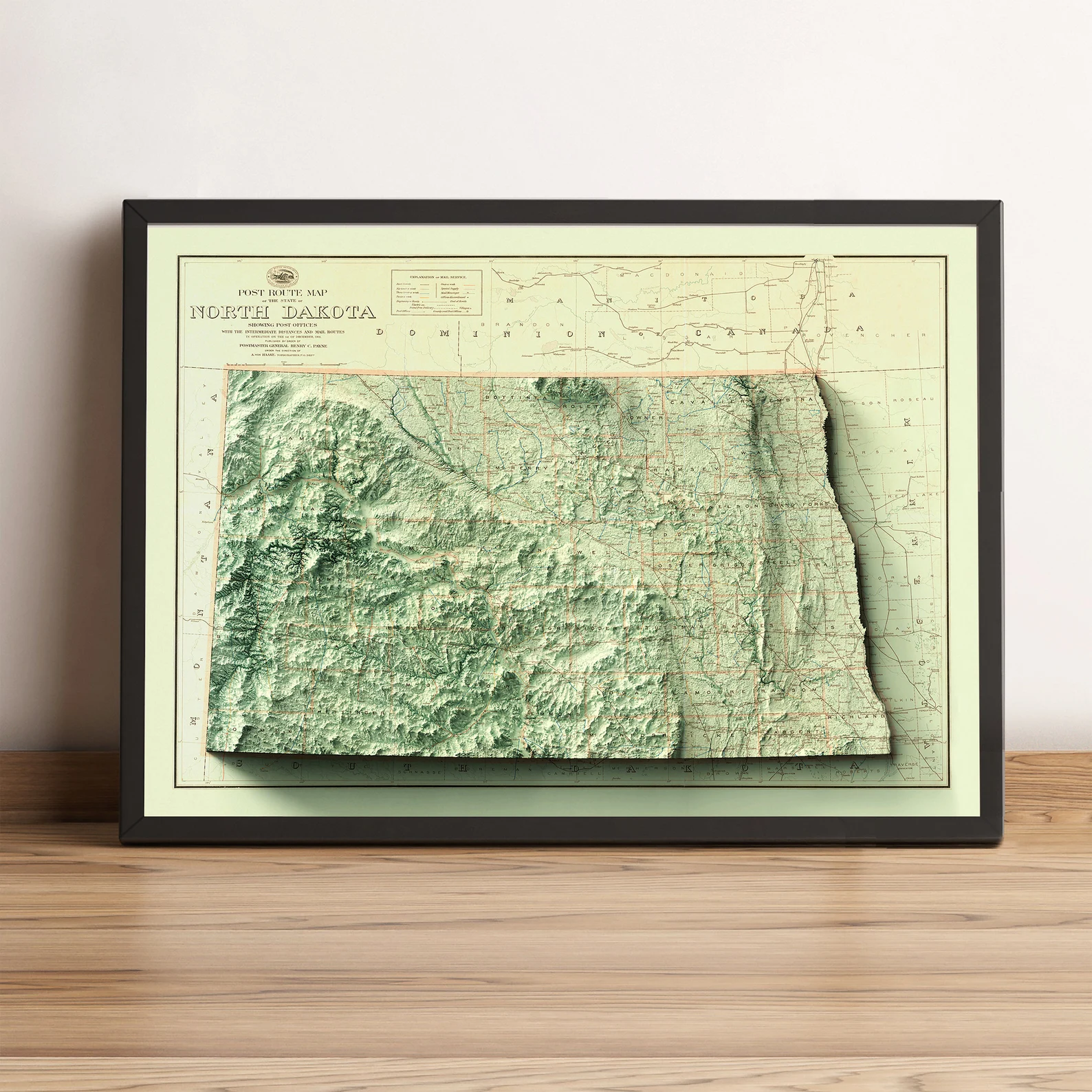 North Dakota (USA) vintage framed shaded relief map in black frame. Artistic print highlighting mountains with a realistic terrain effect