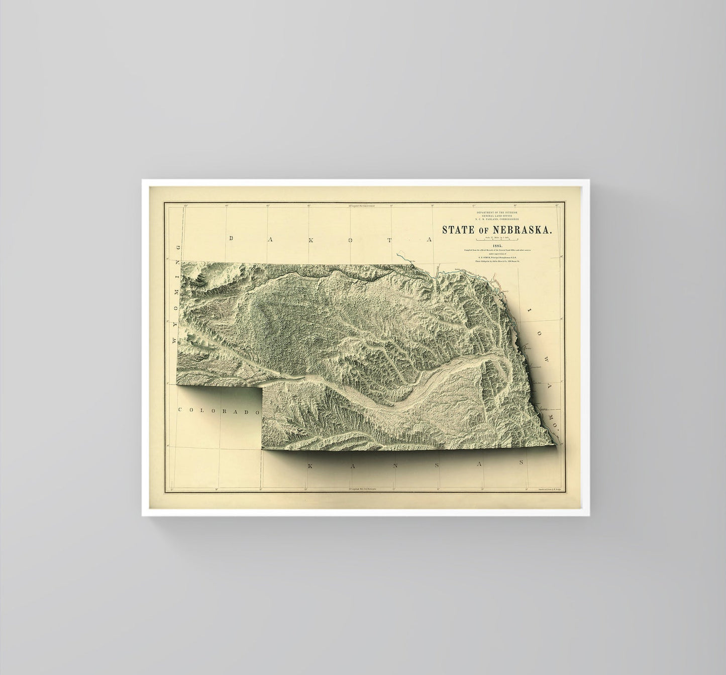 Nebraska (USA) vintage framed shaded relief map in white frame. Artistic print highlighting mountains with a realistic 3d effect