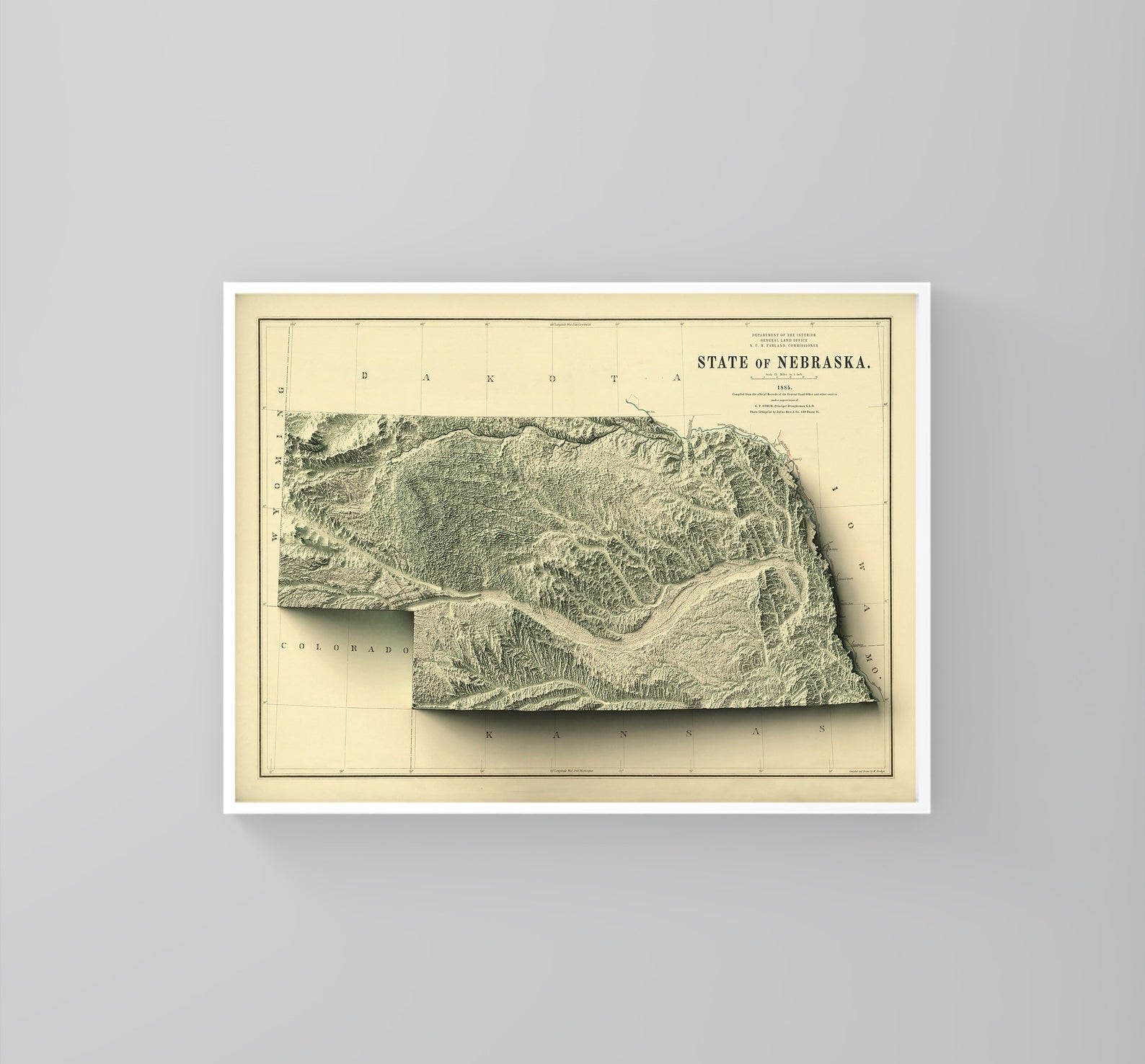 Nebraska (USA) vintage framed shaded relief map in white frame. Artistic print highlighting mountains with a realistic 3d effect