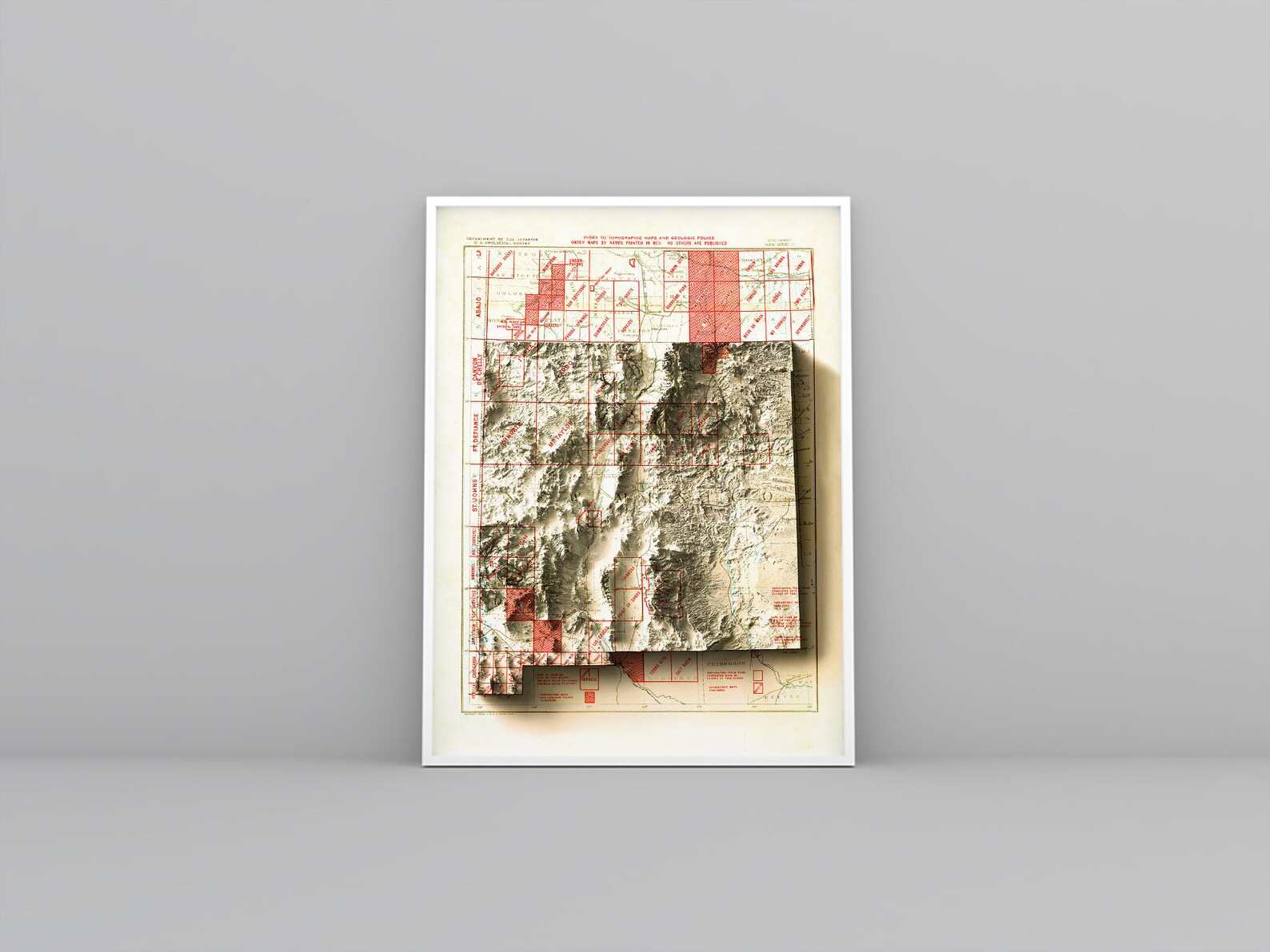 New Mexico (USA) vintage framed shaded relief map in white frame. Artistic print highlighting mountains with a realistic 3d effect