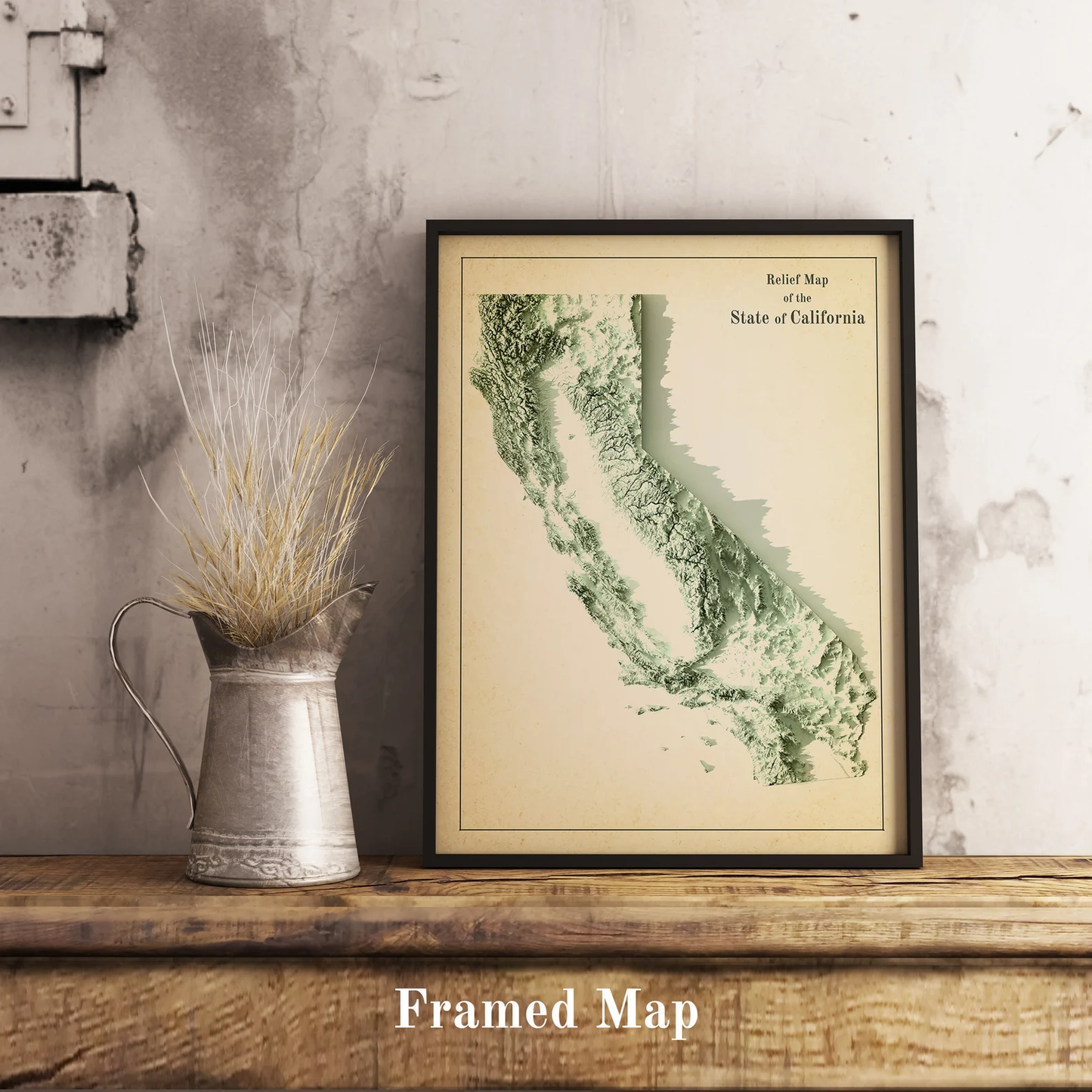 Vintage California (USA) shaded relief map in black frame. Realistic terrain art print for home decor, displayed on rustic wooden table