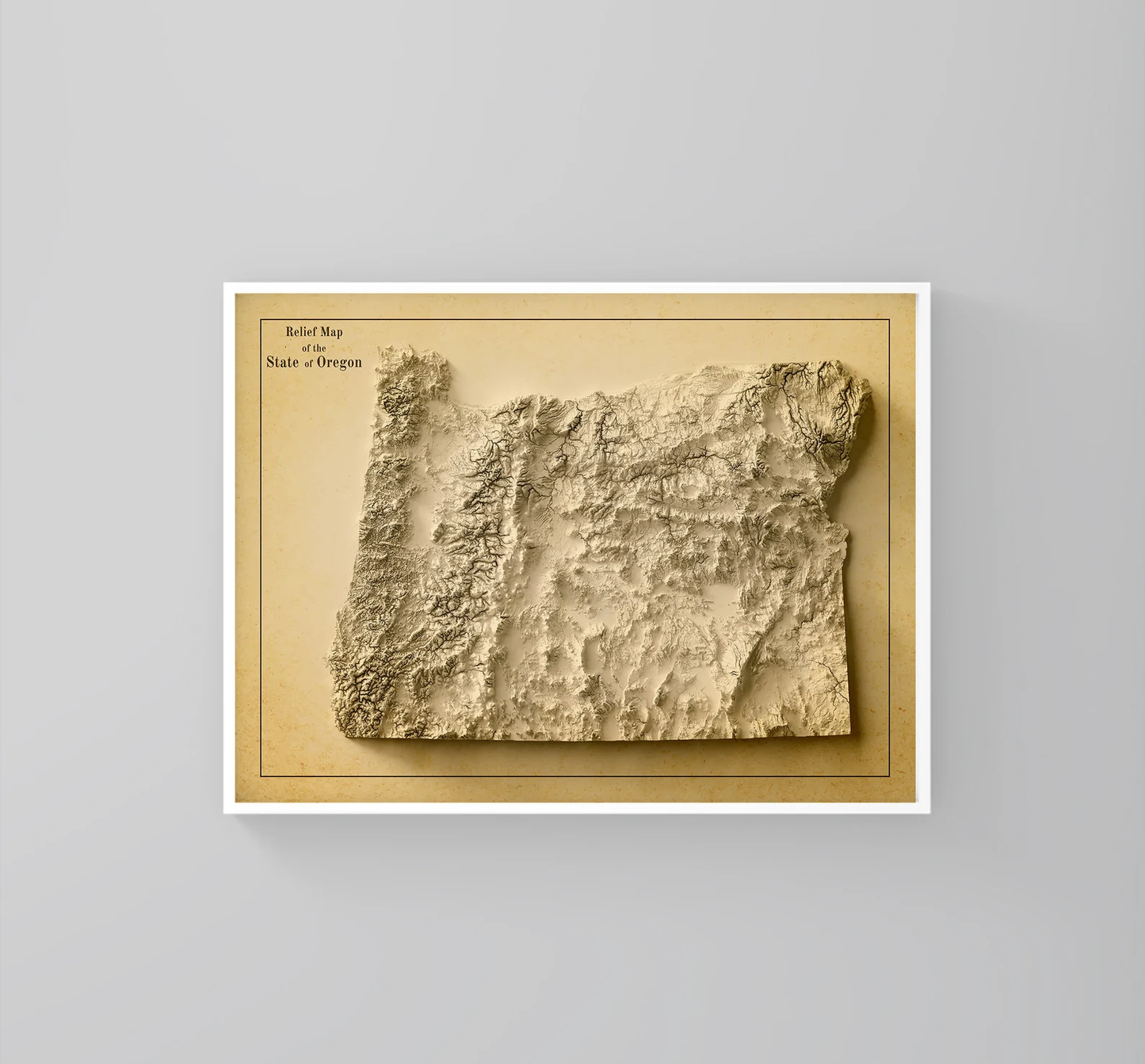 Oregon (USA) vintage framed shaded relief map in white frame. Artistic print highlighting mountains with a realistic 3d effect
