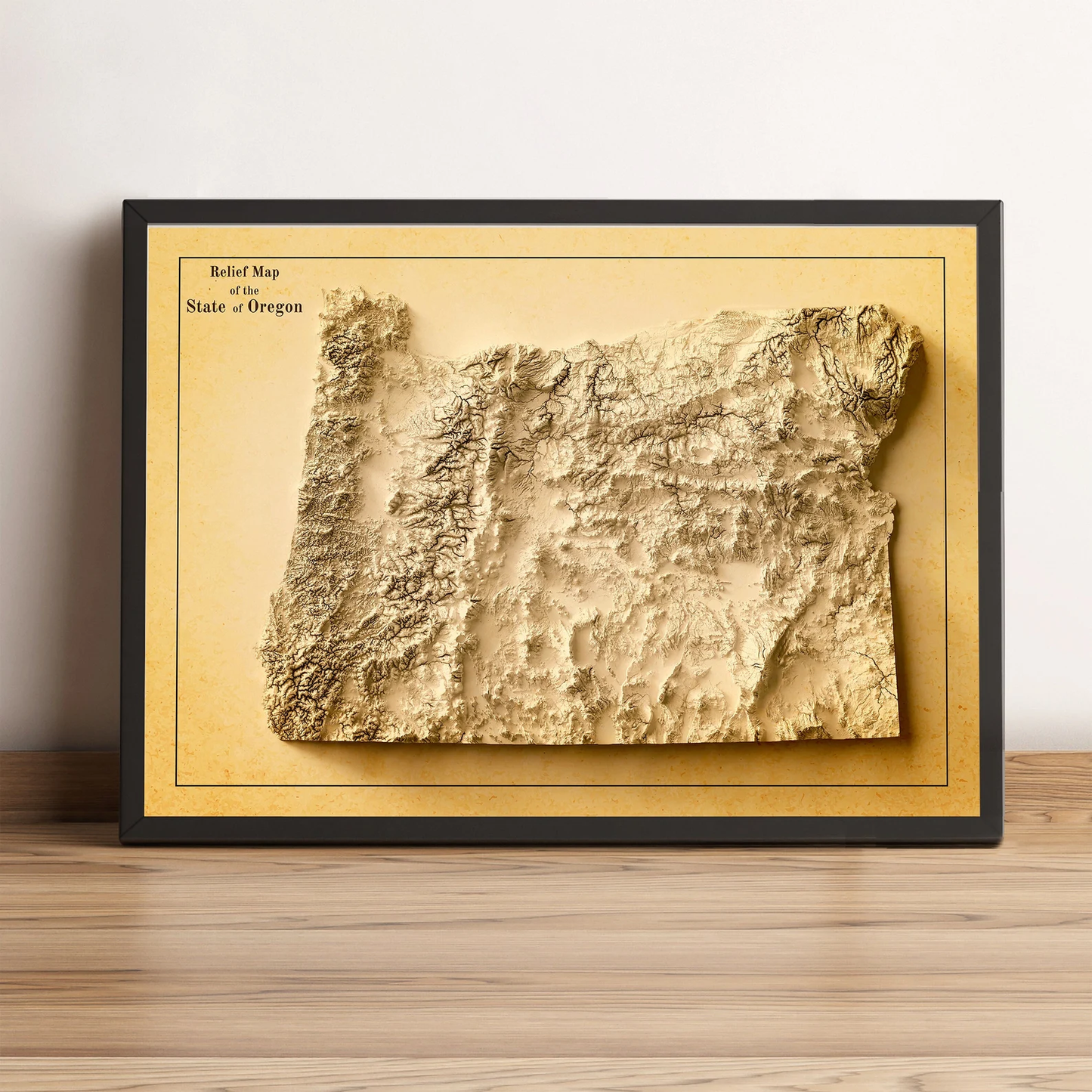 Oregon (USA) vintage framed shaded relief map in black frame. Artistic print highlighting mountains with a realistic terrain effect