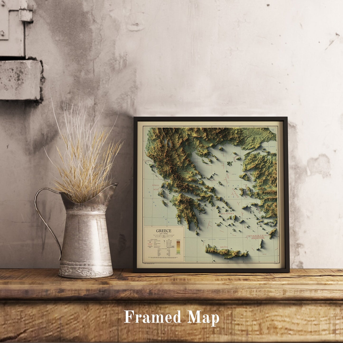 Vintage Greece shaded relief map in black frame. Realistic terrain art print for home decor, displayed on rustic wooden table