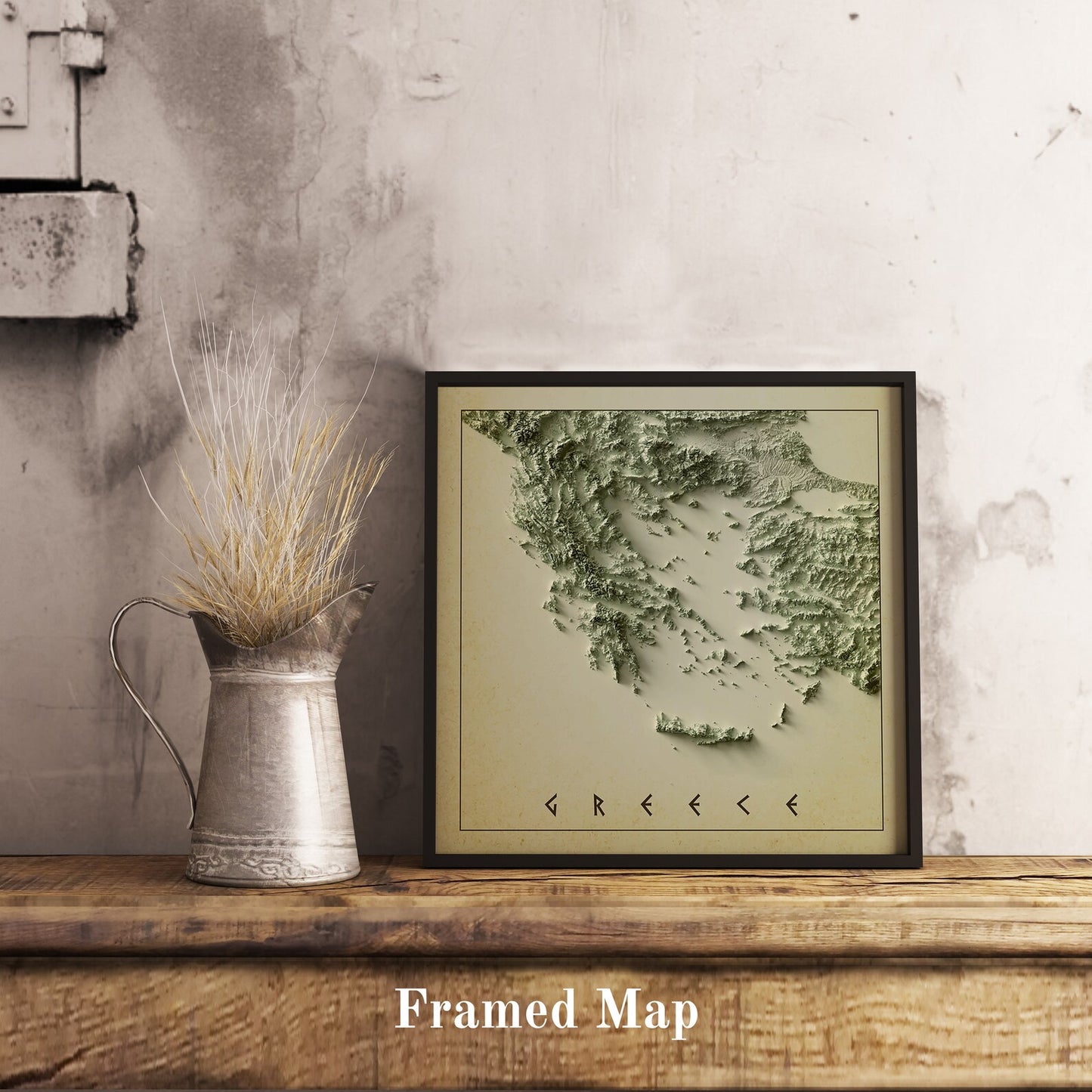 Vintage Greece shaded relief map in black frame. Realistic terrain art print for home decor, displayed on rustic wooden table