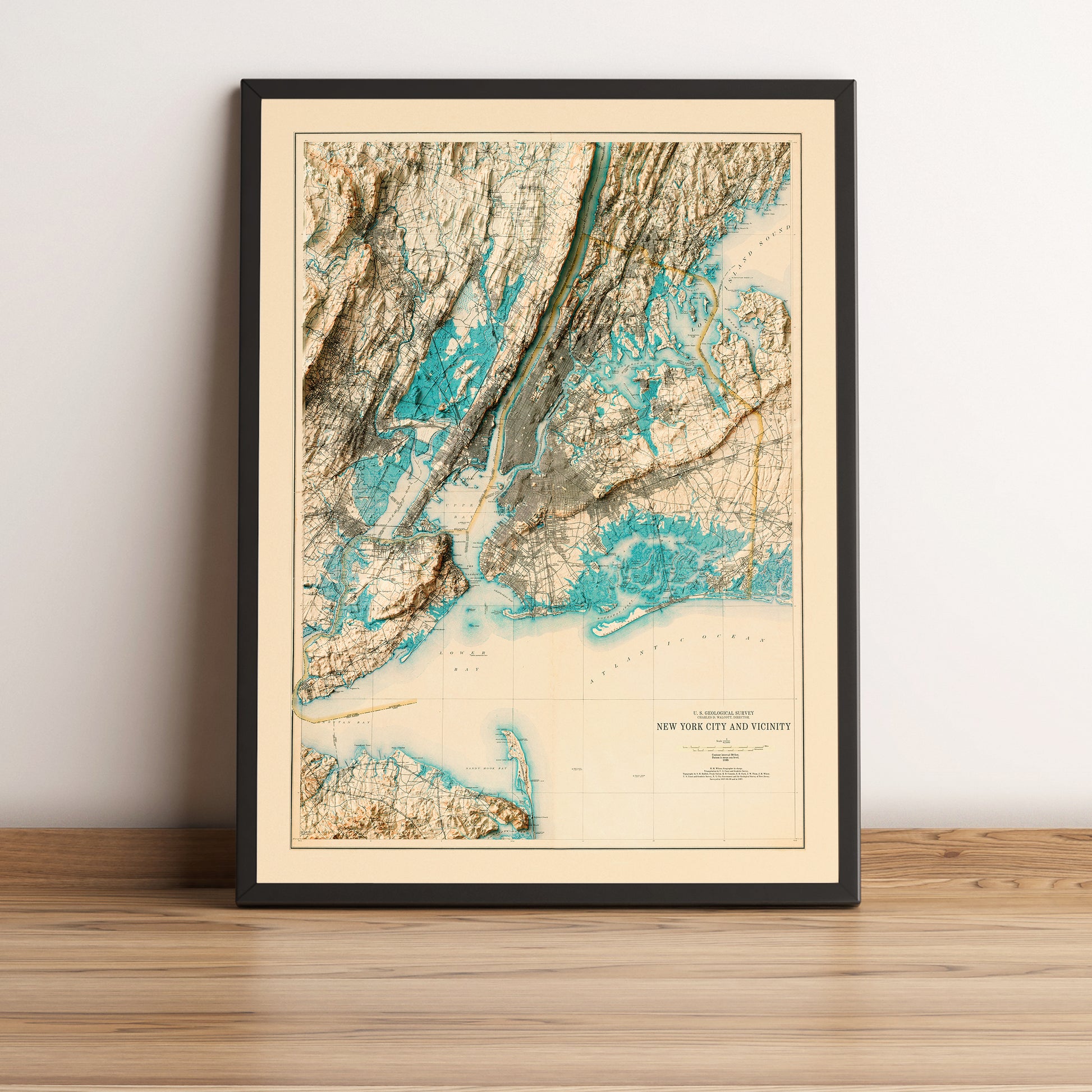 New York City vintage framed shaded relief map in black frame. Artistic print highlighting mountains with a realistic terrain effect