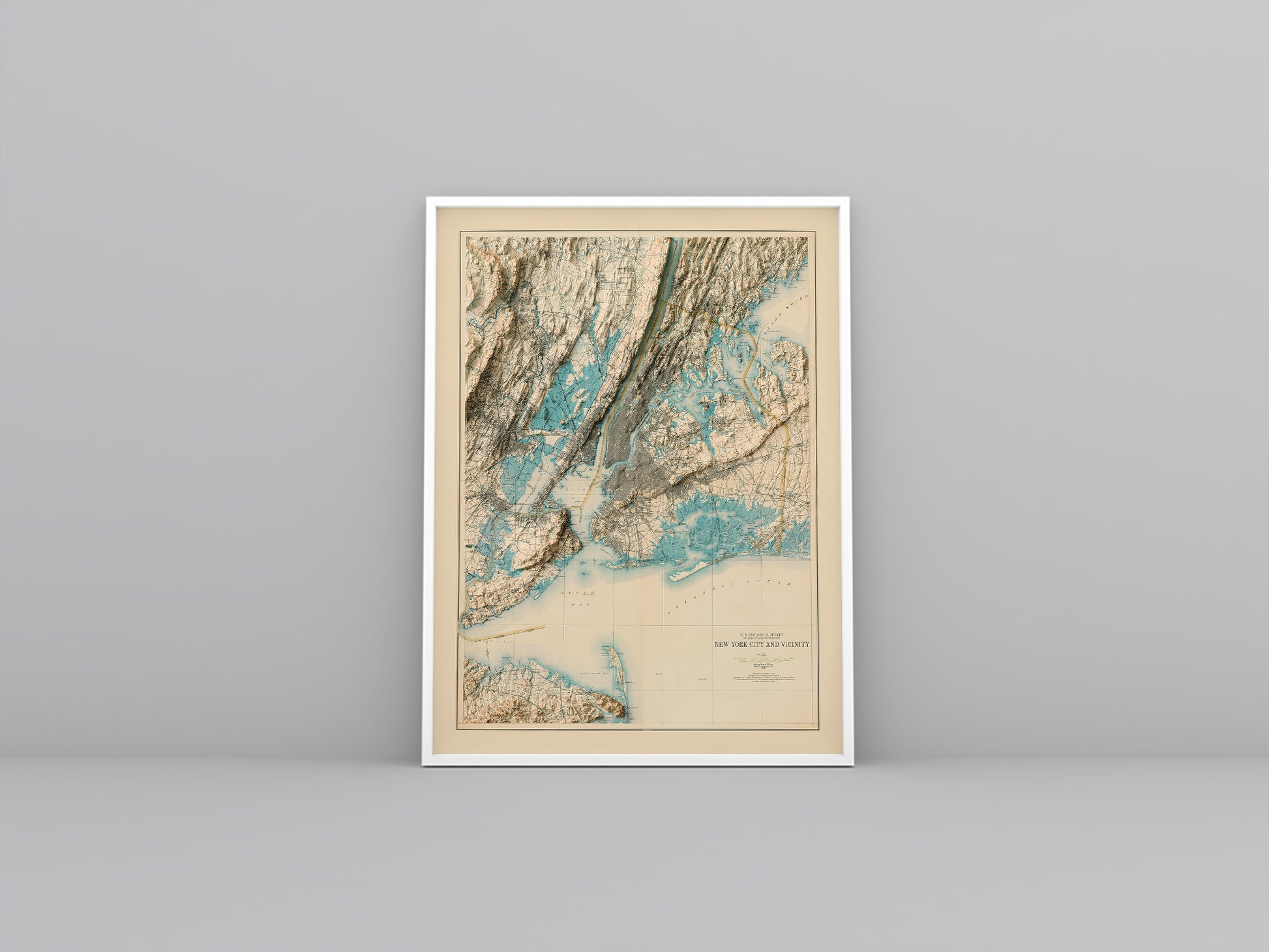 New York City vintage framed shaded relief map in white frame. Artistic print highlighting mountains with a realistic 3d effect