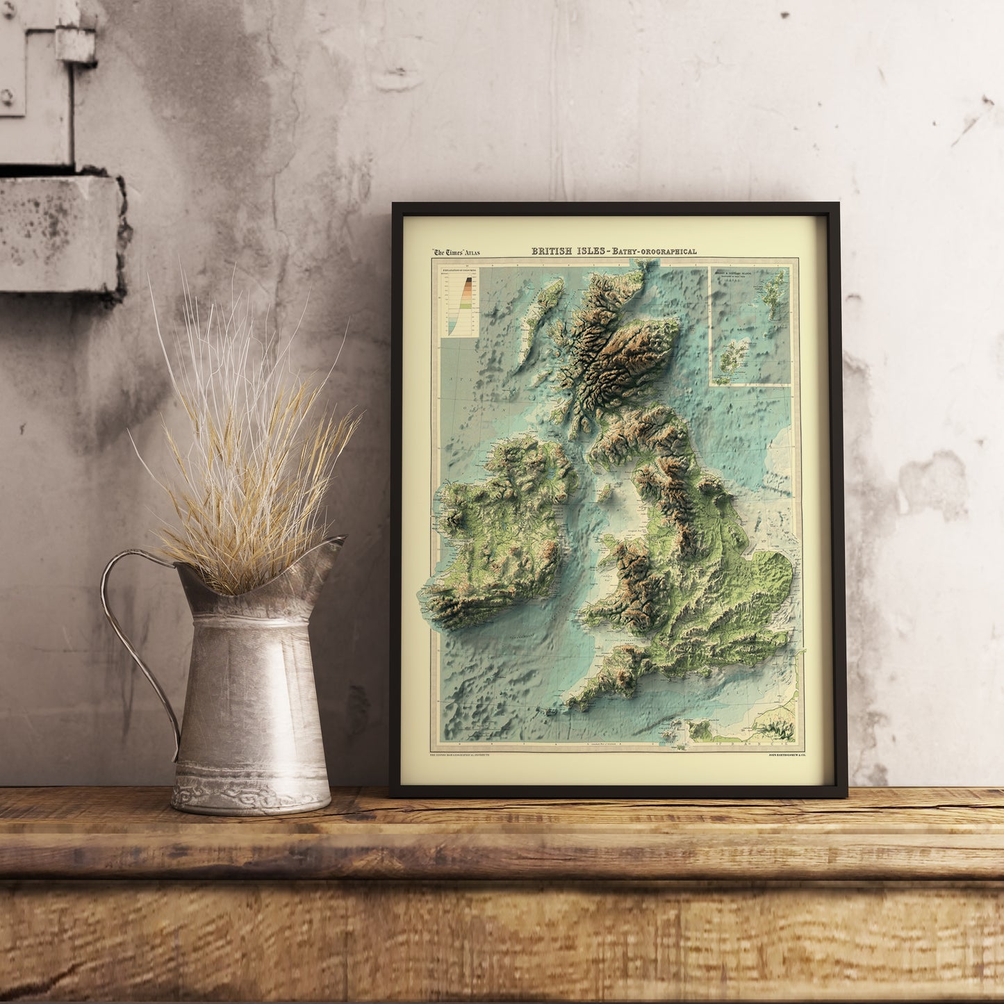 Birtish and Irish Isles bathymetric shaded relief map in black frame. Realistic terrain art print for home decor, displayed on rustic wooden tablea