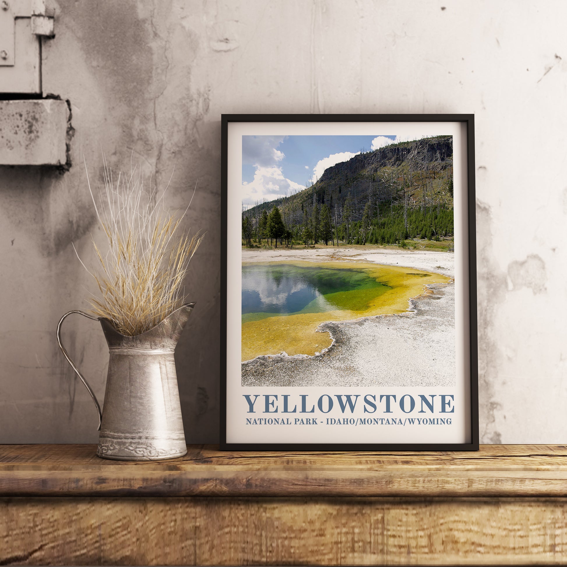 Yellowstone National Park vintage travel poster. Photographic art print for home decor, displayed on rustic wooden table